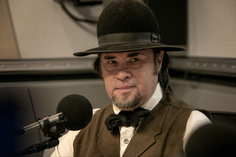 Historian and Thoreau interpreter Richard Smith behind a microphone at WBUR. (Robin Lubbock/WBUR)