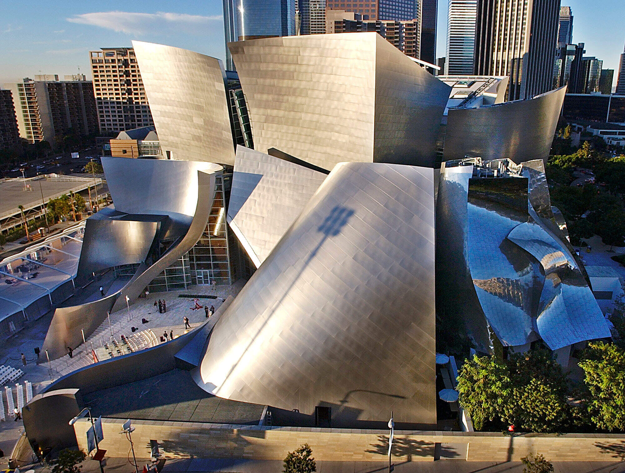 This Oct. 20, 2003 file photo shows early morning sun illuminating the new Walt Disney Concert Hall in downtown Los Angeles. (Nick Ut/AP)