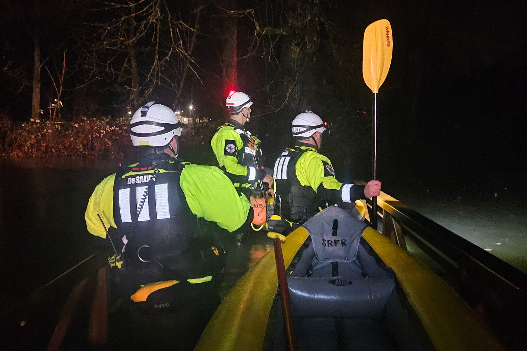 This photo provided by Snohomish Regional Fire & Rescue shows a rescue crew responding to a high-water rescue call as heavy rains from an atmospheric river soaked the Pacific Northwest on Monday, Dec. 8, 2025, in Sultan, Washington. (Snohomish Regional Fire & Rescue via AP)
