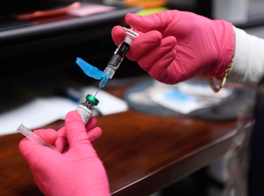 Anna Hicks prepares a measles, mumps and rubella vaccine at the Andrews County Health Department, Tuesday, April 8, 2025, in Andrews, Texas. (Annie Rice/AP)