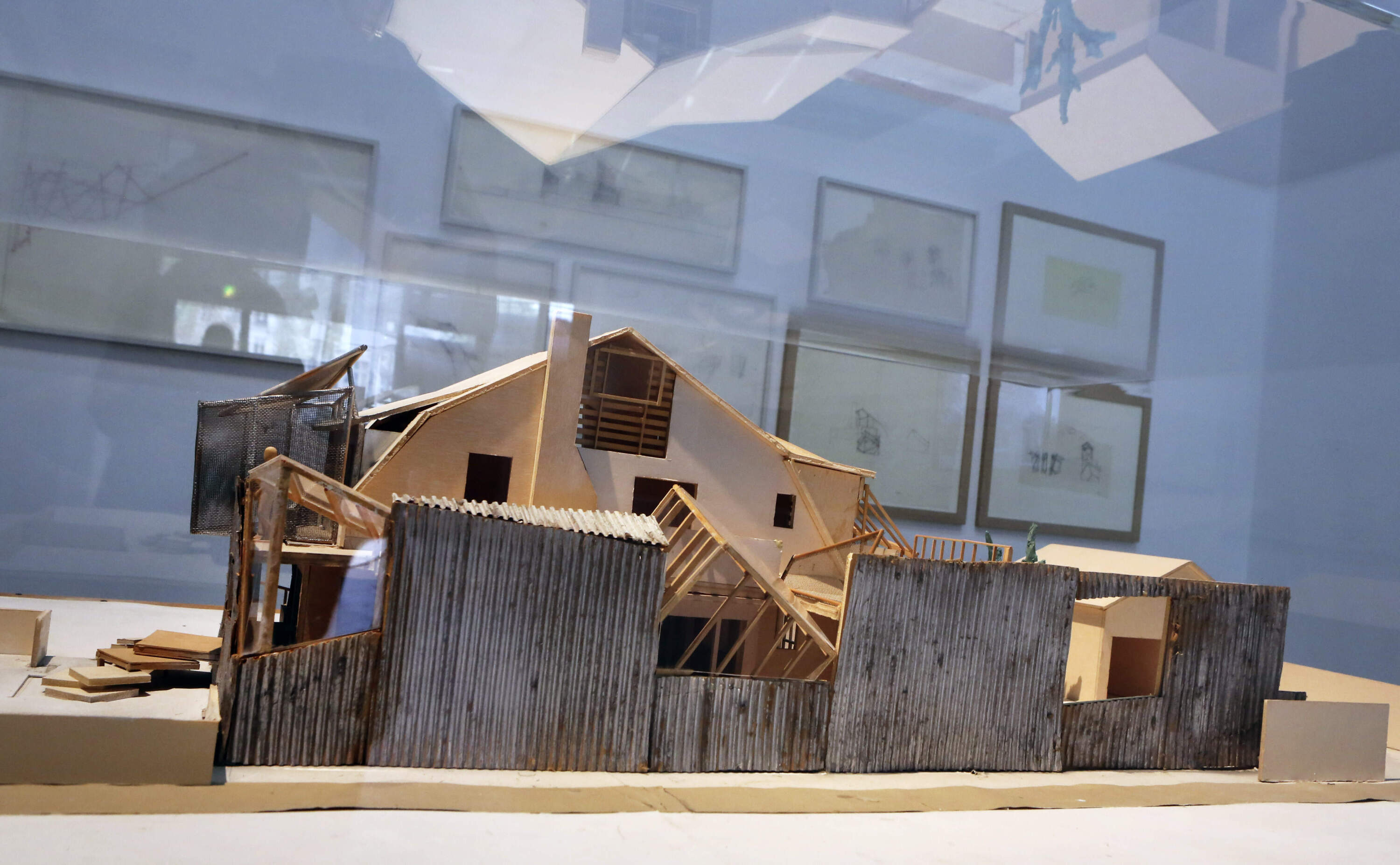 A model of Frank Gehry's residence , built in Santa Monica, California, is presented at the Pompidou Center in Paris, Monday Oct. 6, 2014, as part of a retrospective on American-Canadian architect Frank Gehry. (Remy de la Mauviniere/AP)