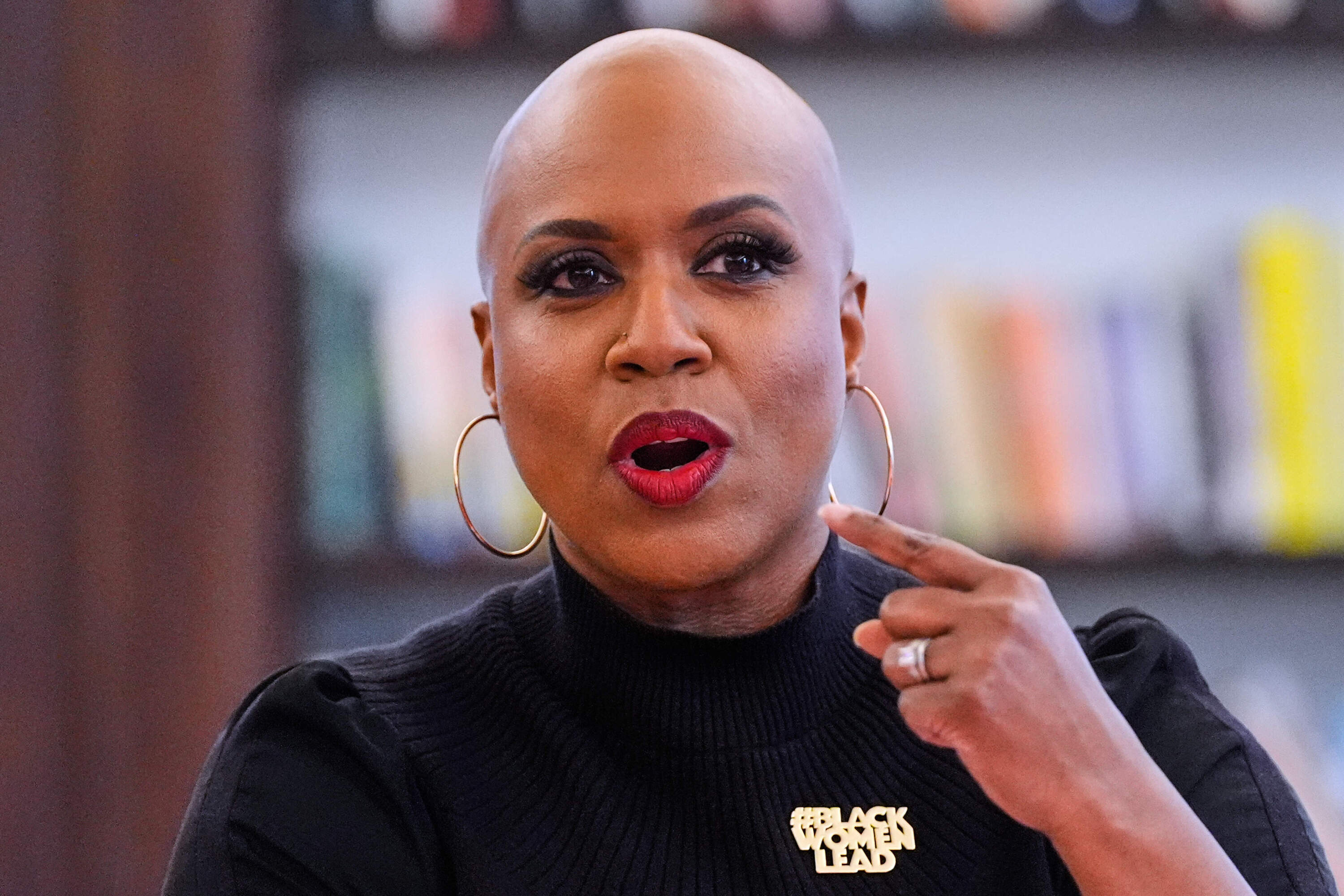 Rep. Ayanna Pressley gestures at a roundtable meeting in Boston in November. (Charles Krupa/AP)