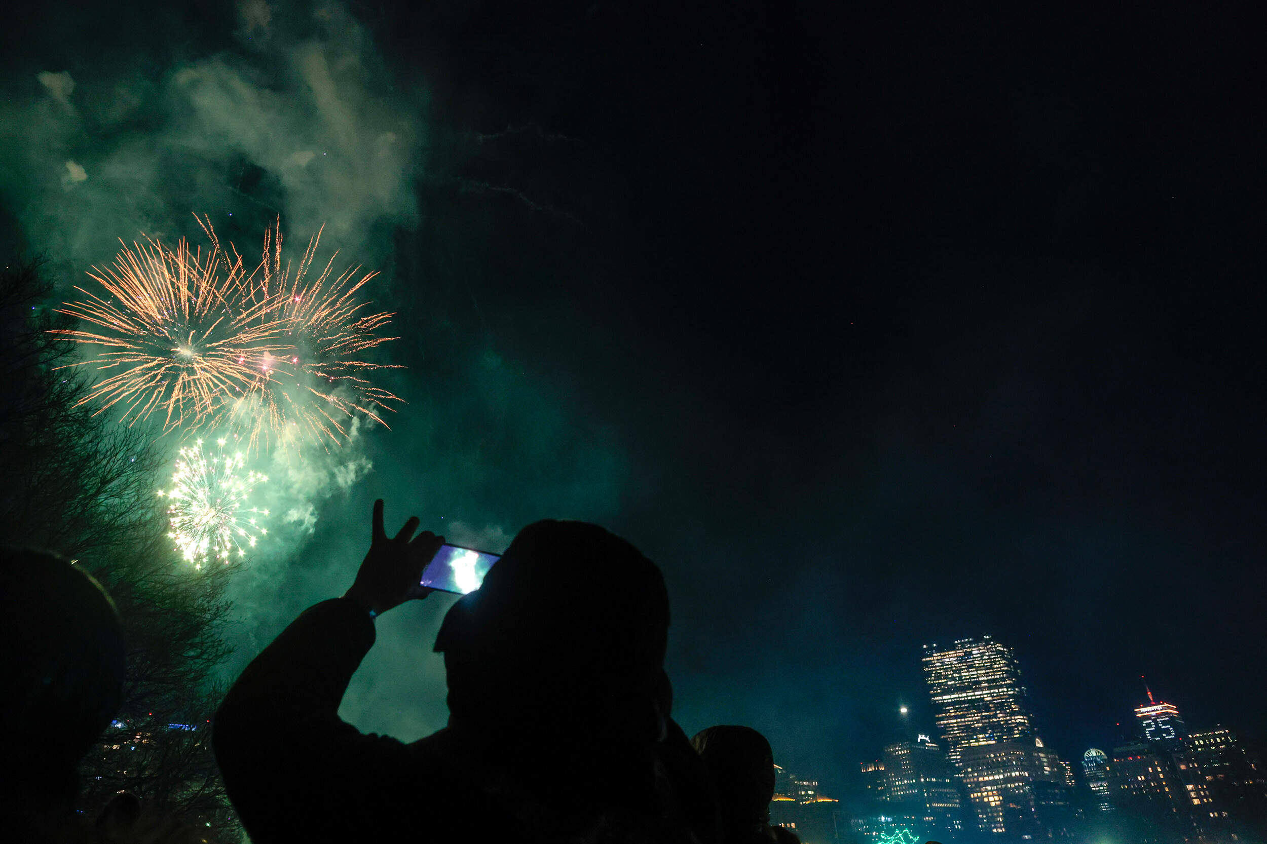 Fireworks light up the sky during the First Night Boston 2025 celebration on Boston Common. (Craig F. Walker/The Boston Globe via Getty Images)