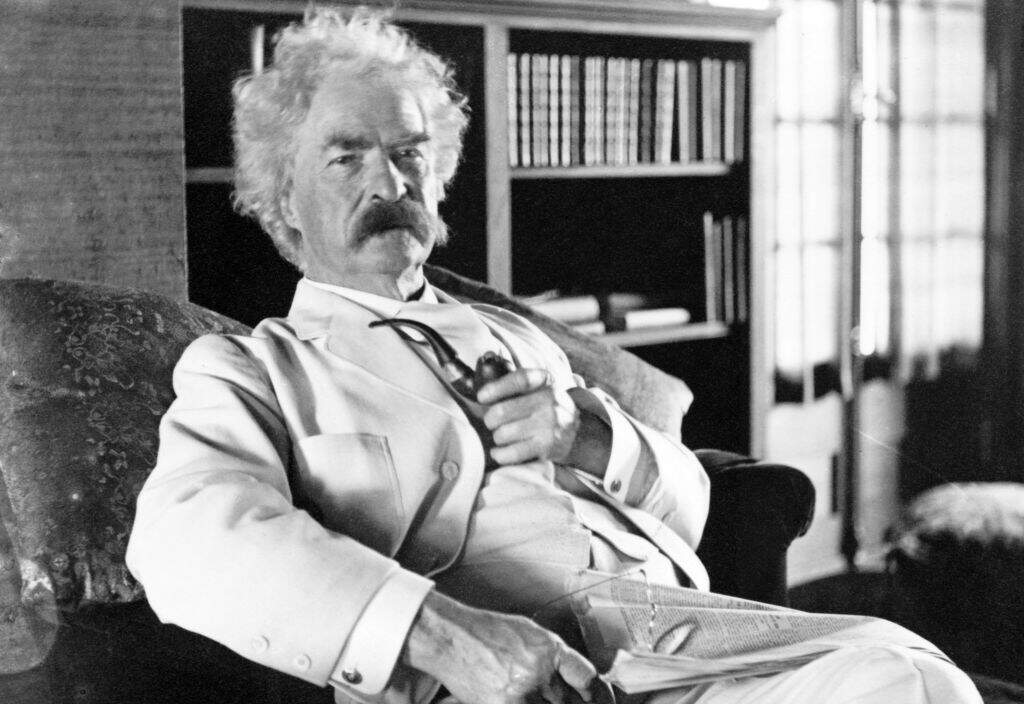 Author Mark Twain poses for a portrait in 1900. (Library of Congress/Getty Images)