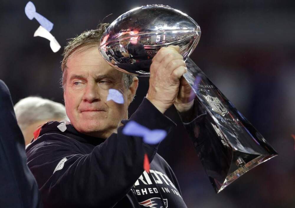 New England Patriots then-head coach Bill Belichick holds up the Lombardi Trophy as he celebrates after the Patriots defeated the Seattle Seahawks 28-24 in NFL Super Bowl XLIX football game Sunday, Feb. 1, 2015. (Patrick Semansky/AP)