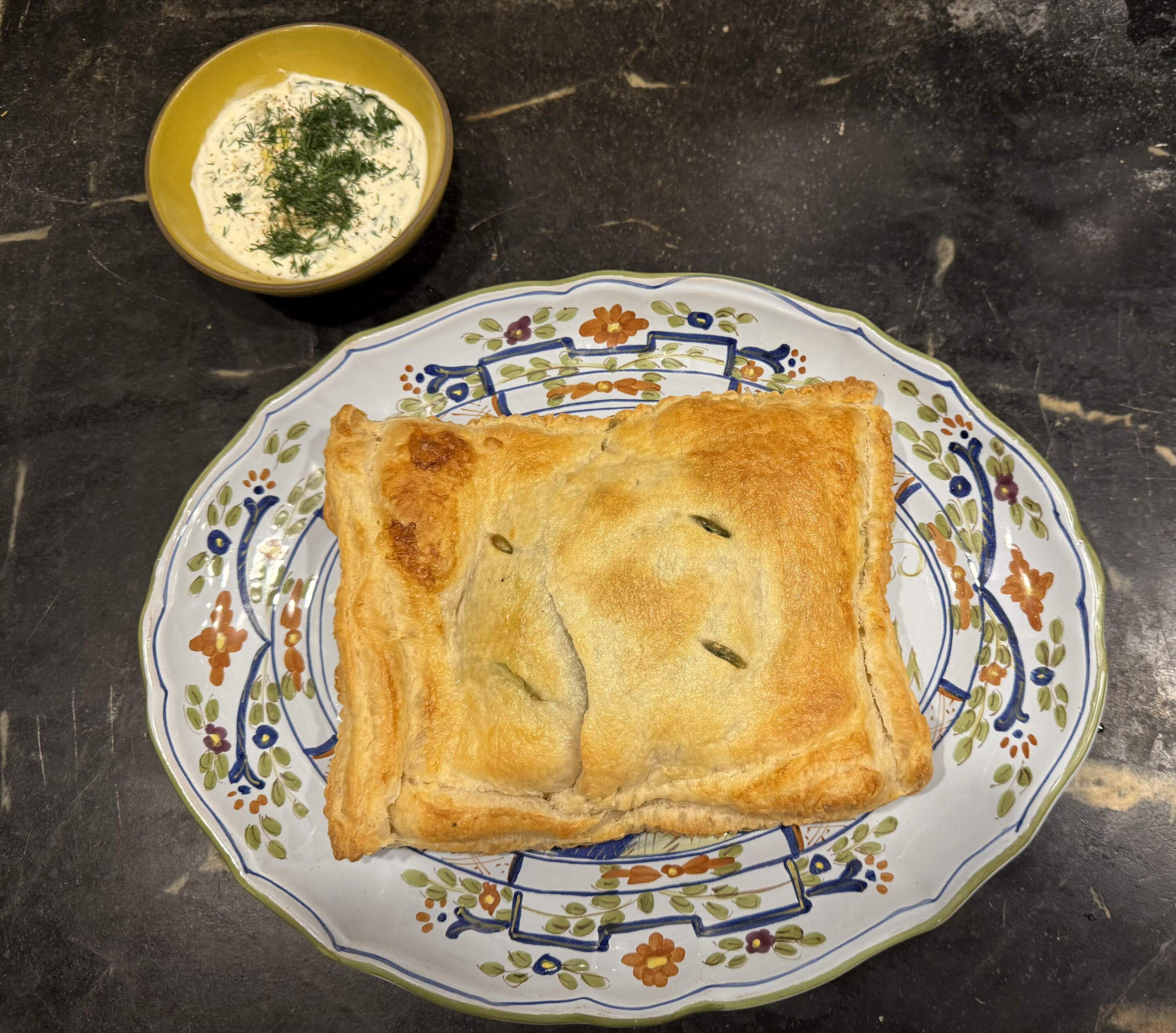 Salmon and creamed baby spinach en croute. (Kathy Gunst/Here & Now)