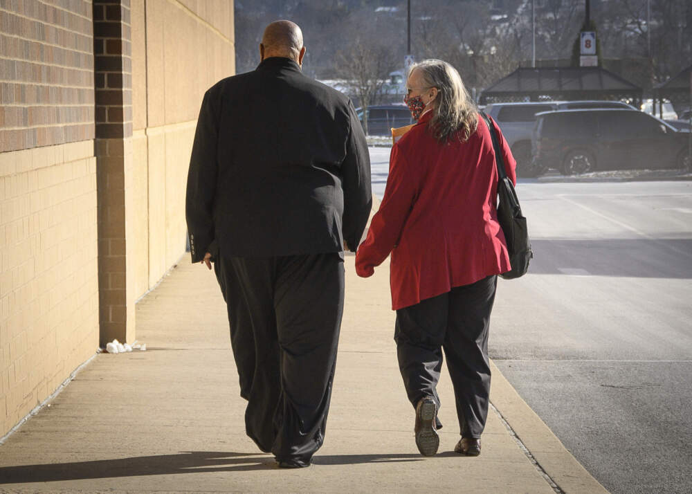 Cedric Lodge and his wife Denise leave court after a sentencing hearing in Williamsport, Pa. (Ralph Wilson for WBUR)