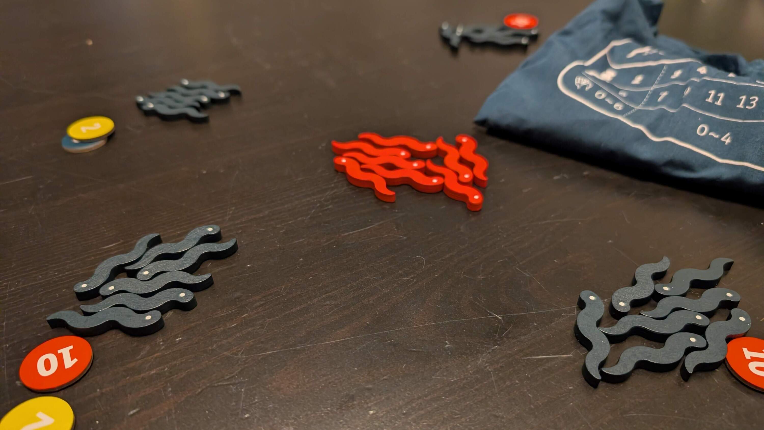 Snakes and eels are shaped identically in "Wiggle Roulette," making it hard to tell if you're fishing for points or courting your doom. (Courtesy of James Mastromarino)