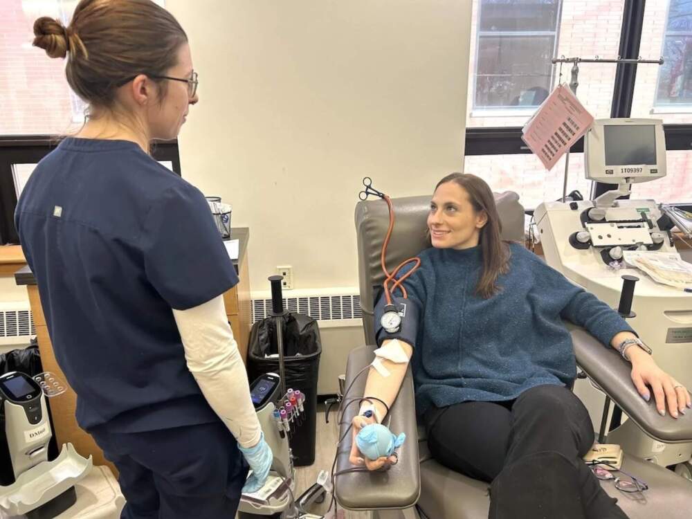 Arielle Nitenson donates blood at the Rhode Island Blood Center in Providence, Rhode Island. (Isabella Jibilian/Ocean State Media)