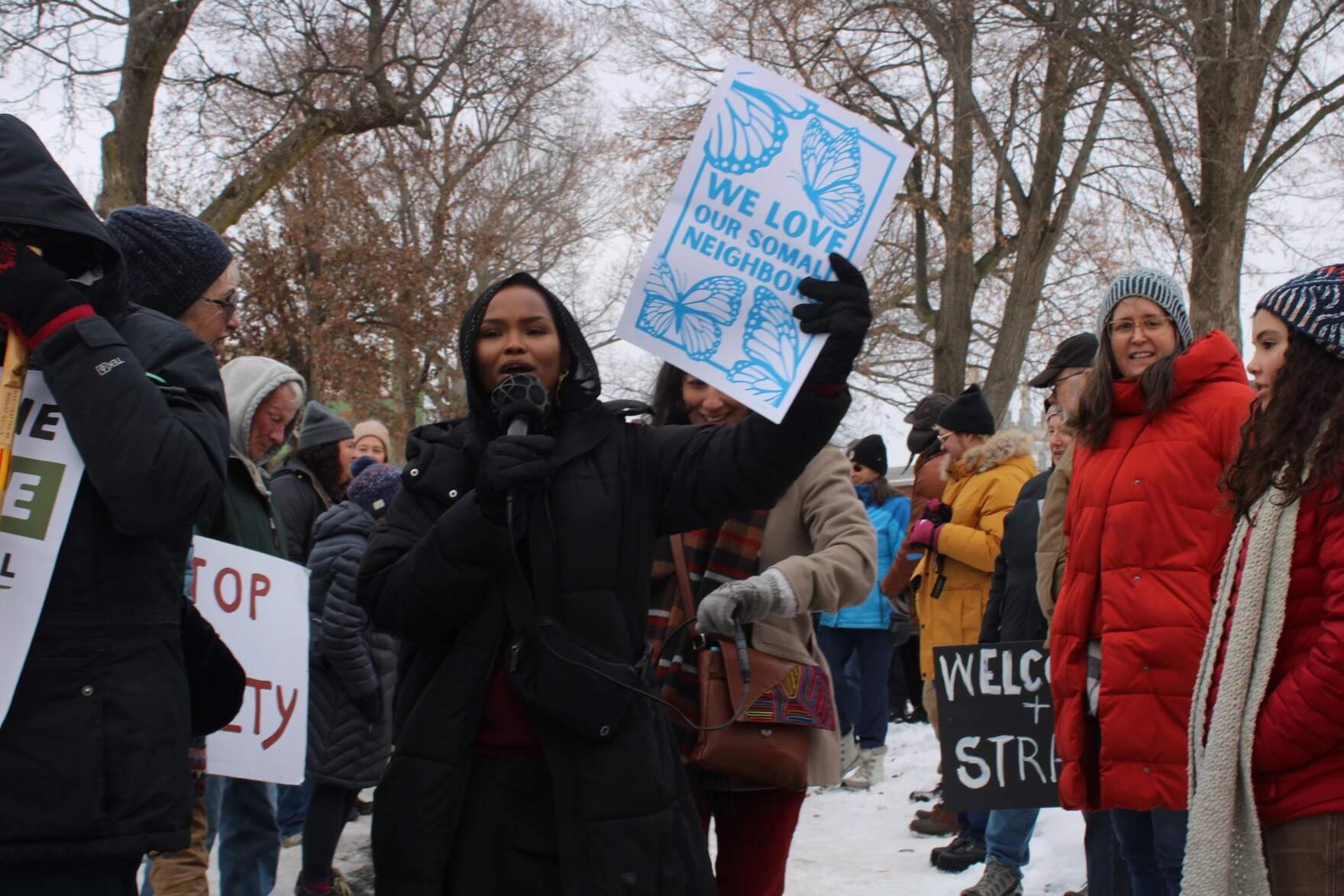 Rally organizer and former Lewiston city councilor Safiya Khalid leads a march from Kennedy Park to a nearby church on Saturday, Dec. 13th, 2025. (Ari Snider/Maine Public
