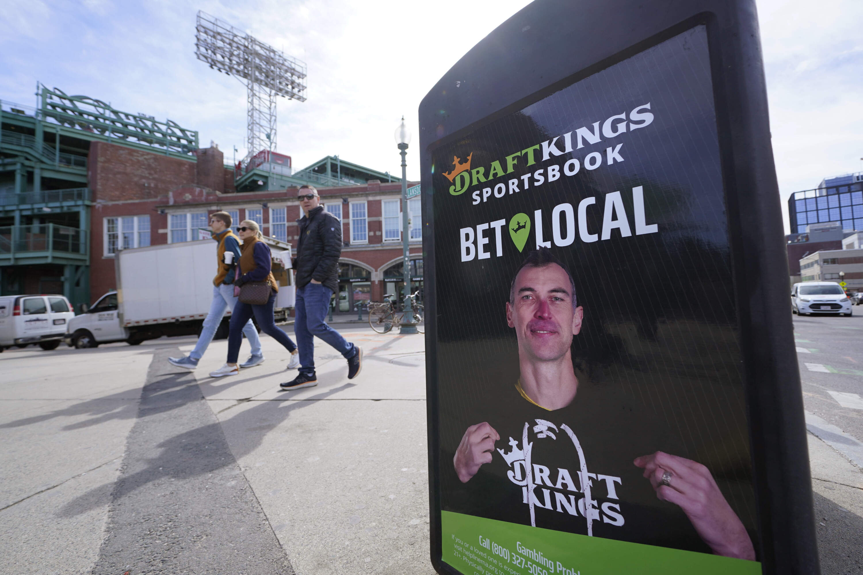 A DraftKing ad on a garbage can outside Fenway Park featuring former Boston Bruin Zdeno Chara.