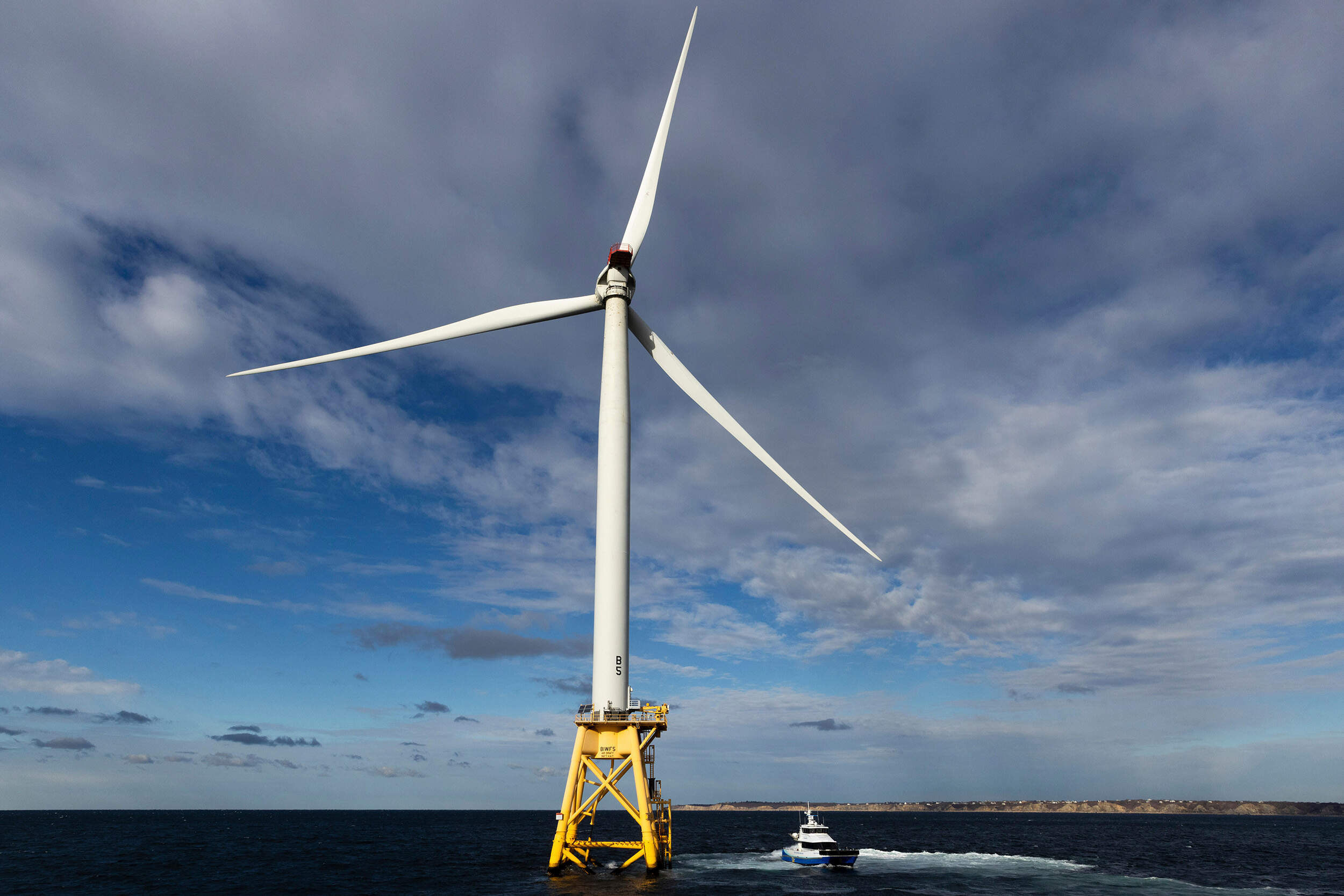 A Block Island Wind Farm turbine operates, Dec. 7, 2023, off the coast of Block Island, R.I., during a tour organized by Orsted. (Julia Nikhinson/AP)