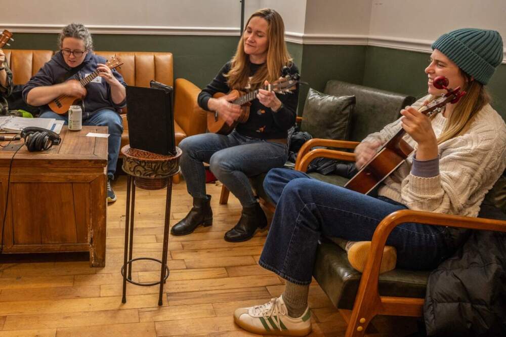 Ukulele players at a meetup of the Strummerville Ukulele Club in Somerville (Sharon Brody/WBUR)