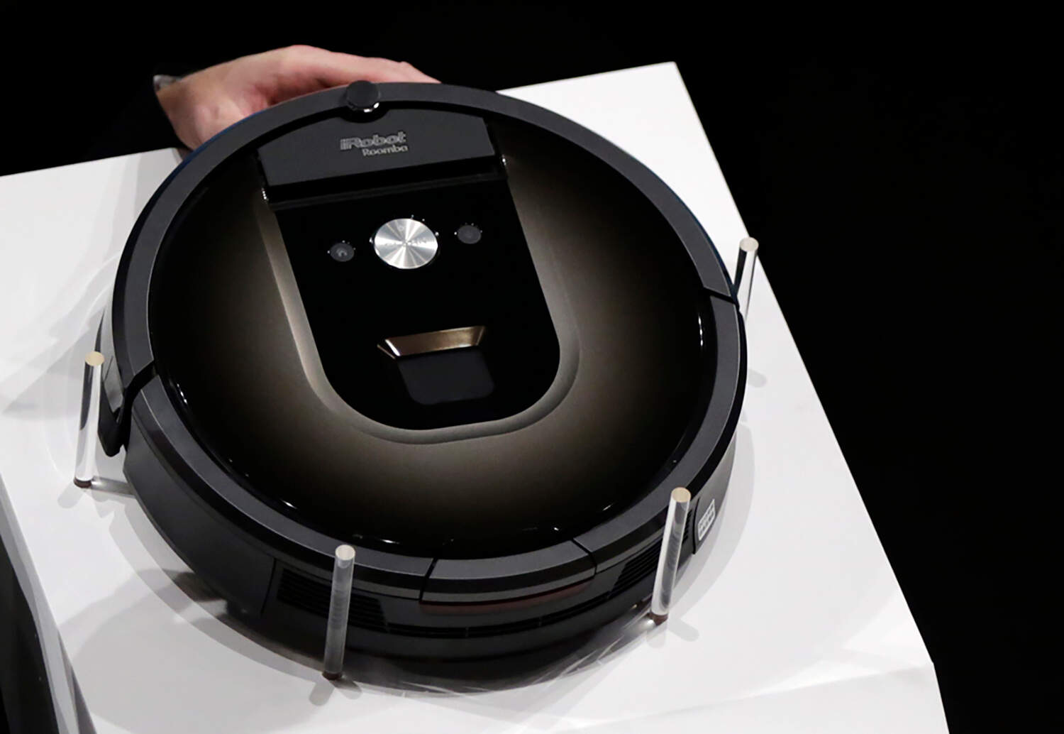A Roomba 980 vacuum cleaning robot is shown during a presentation in Tokyo, on Sept. 29, 2015. (Eugene Hoshiko/AP)