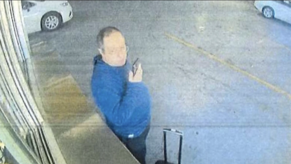 Authorities said this is the man suspected in the Brown University shootings and killing of an MIT professor in Brookline. He is pictured here, authorities said, renting the car he used to drive to Providence. (Courtesy Rhode Island Attorney General’s Office)