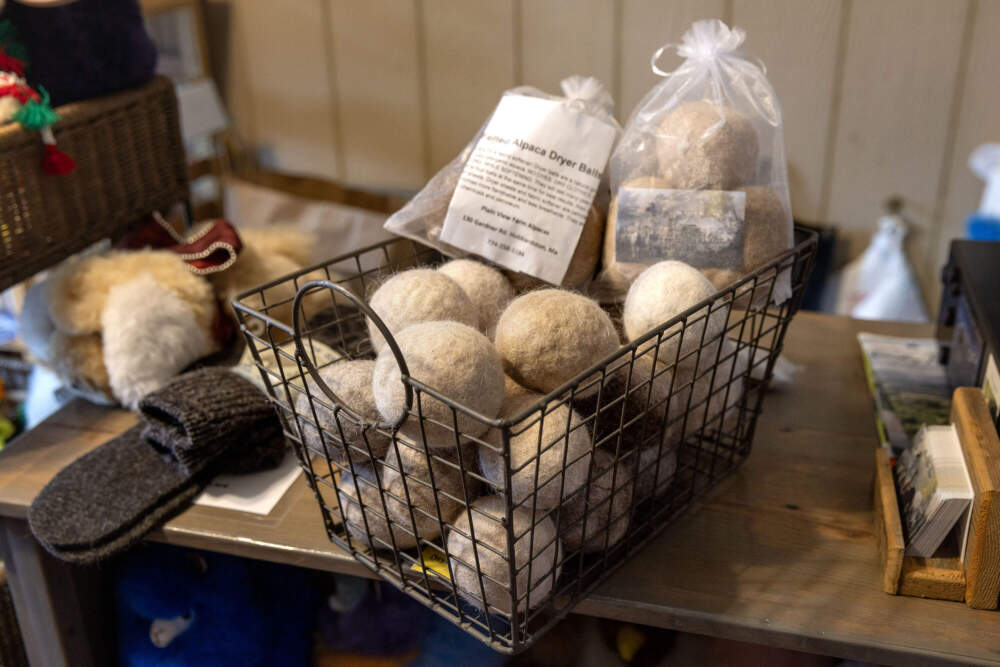 Alpaca wool dryer balls for sale in the store at Plain View Farm in Hubbardston, Mass. (Robin Lubbock/WBUR)