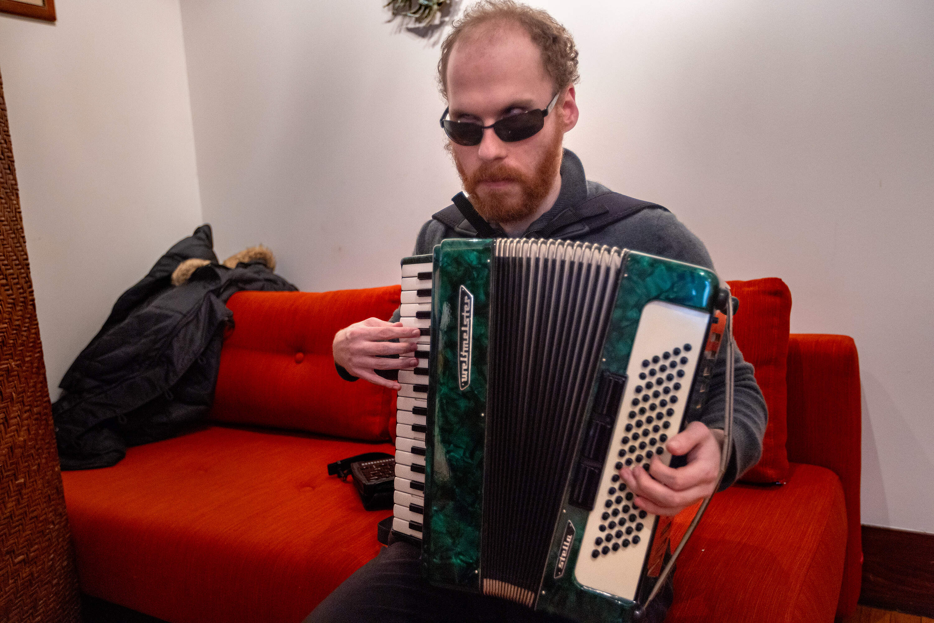 Shifrin plays the accordion. (Jesse Costa/WBUR)