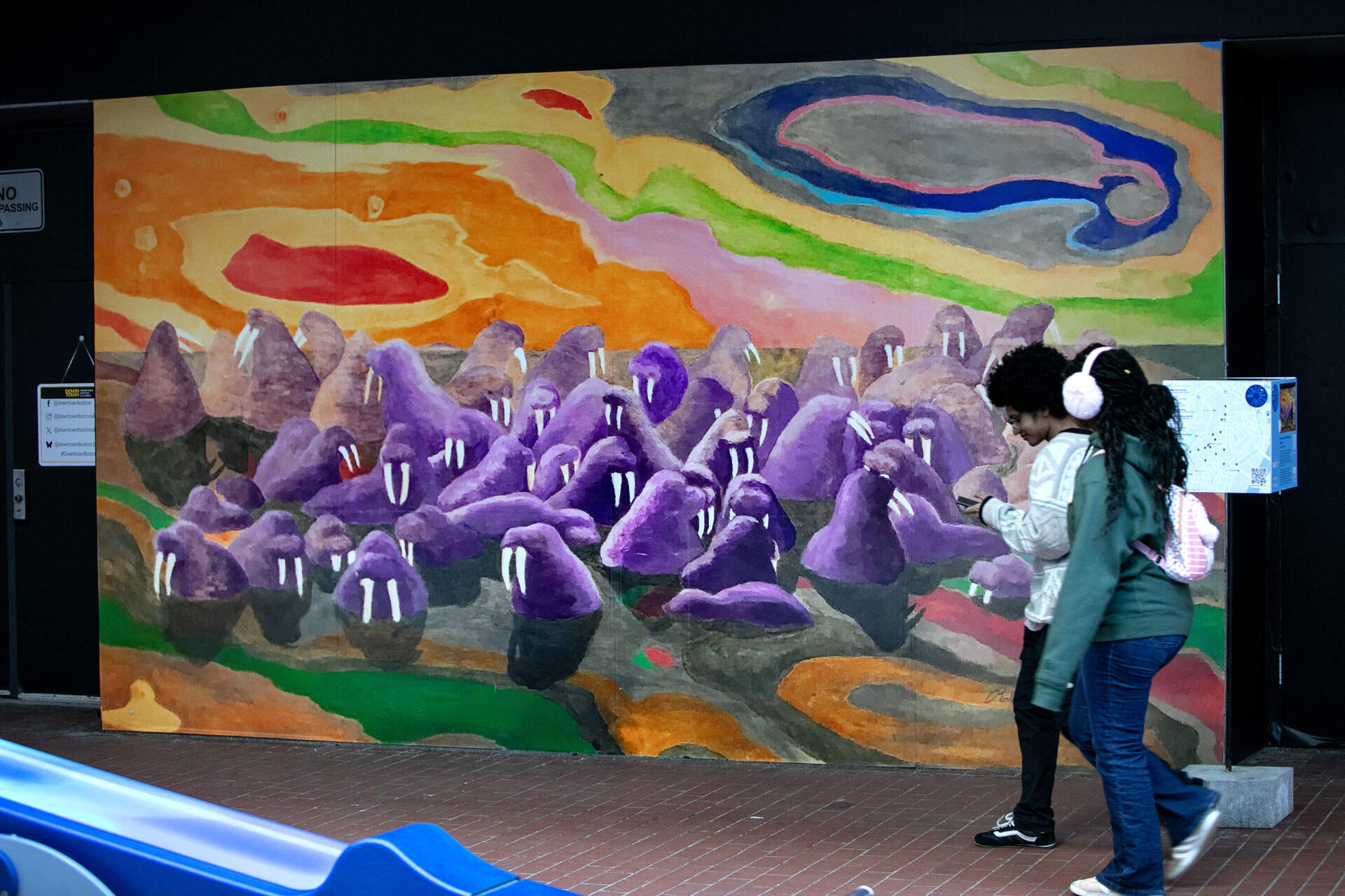 Robert Peters' mural "Walruses on the Rings of Saturn" on Summer Street, part of this year's Winteractive art installation. (Robin Lubbock/WBUR)