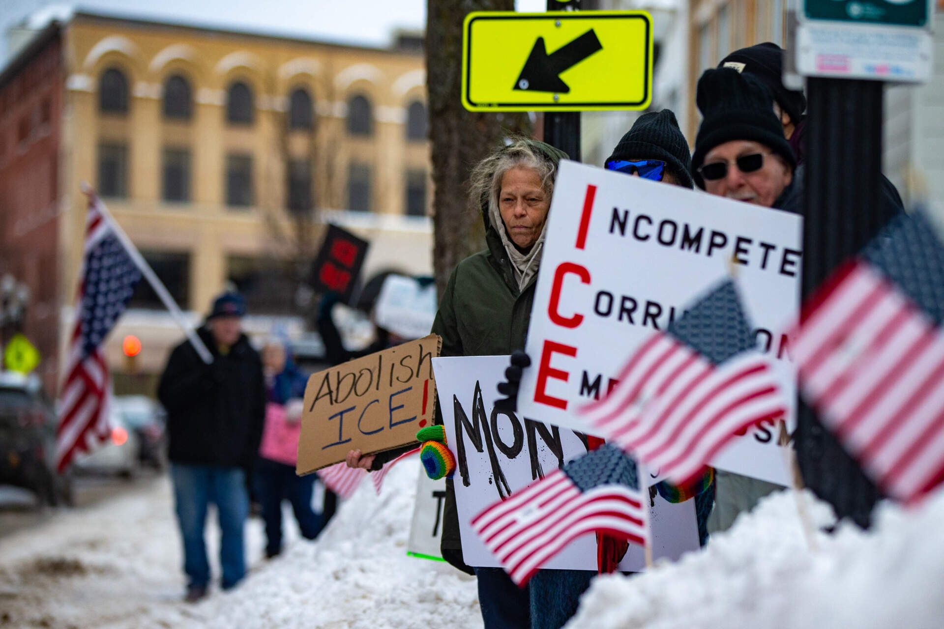 A group of protesters outside of Lewiston District Court rallying against the Immigration and Customs Enforcement presence in Maine. (Jesse Costa/WBUR)