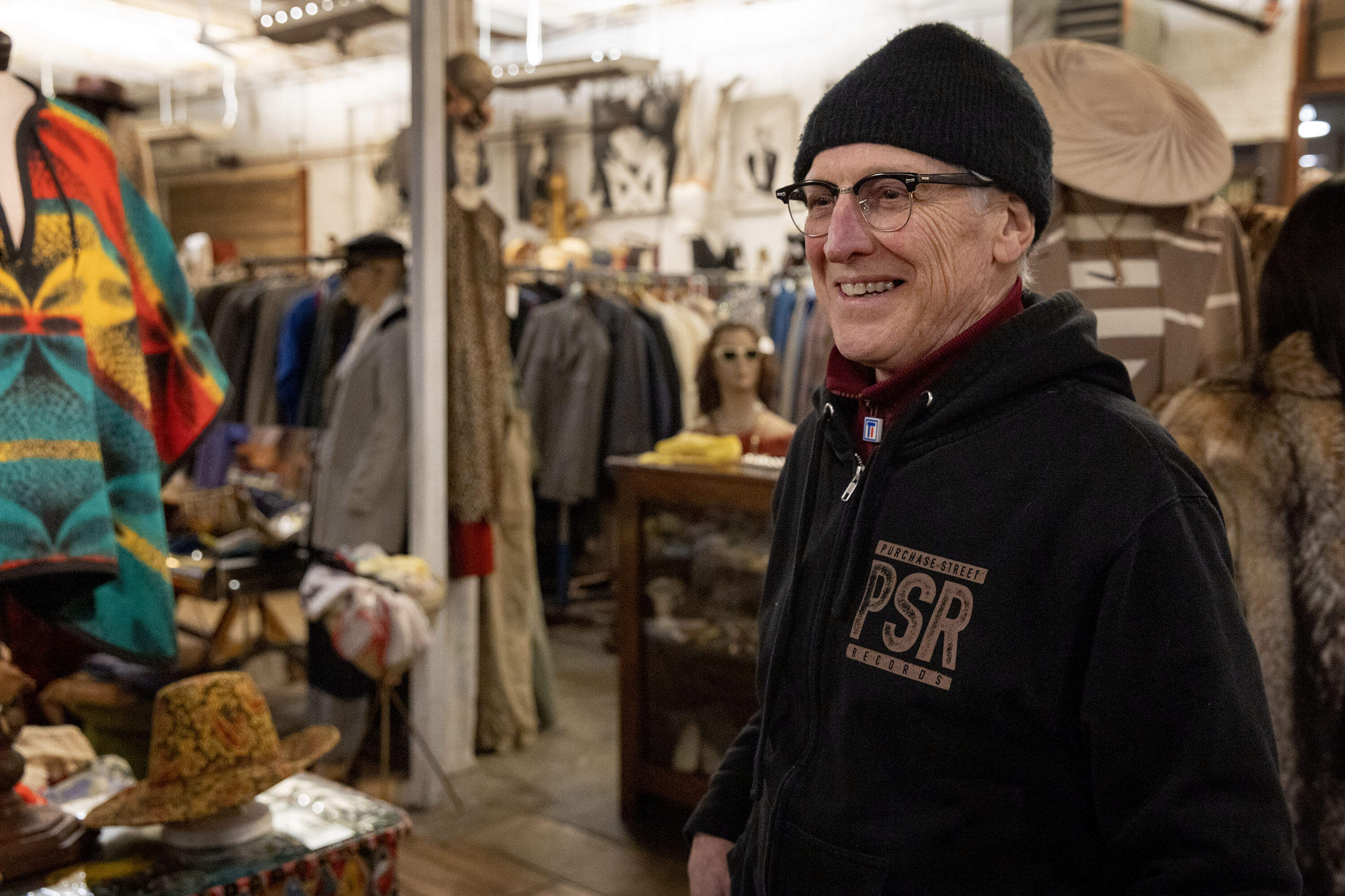 Circa Vintage Wear owner Chris Duval, at the vintage store in New Bedford, Mass. (Robin Lubbock/WBUR)