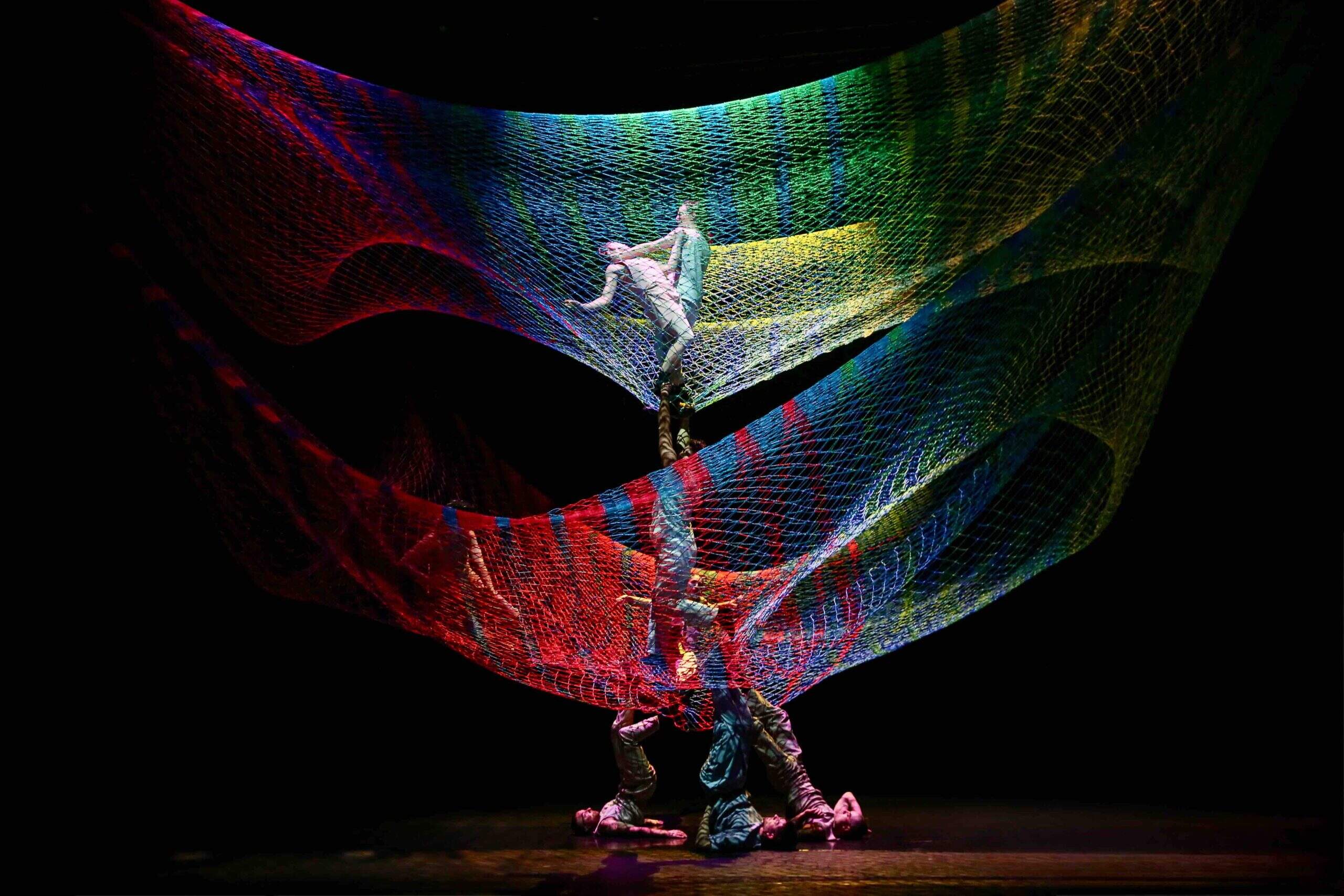 Dancers interact with two 40-foot by 30-foot nets in “Noli Timere," from director and choreographer Rebecca Lazier and sculptor Janet Echelman. (Courtesy Julie Lemberger)