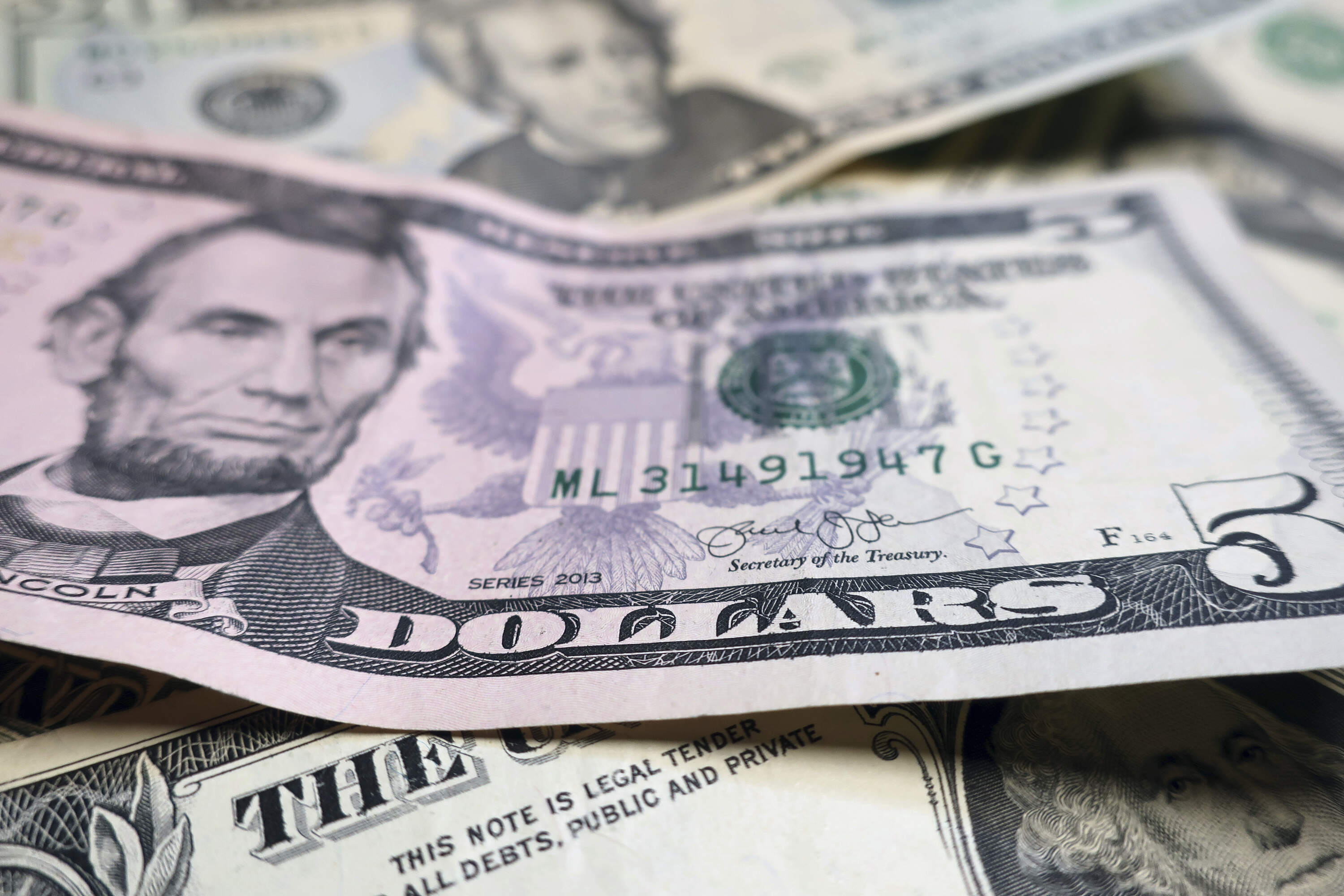 This Wednesday, June 6, 2018, file photo shows U.S. currency in New York. (Ted Shaffrey/AP)