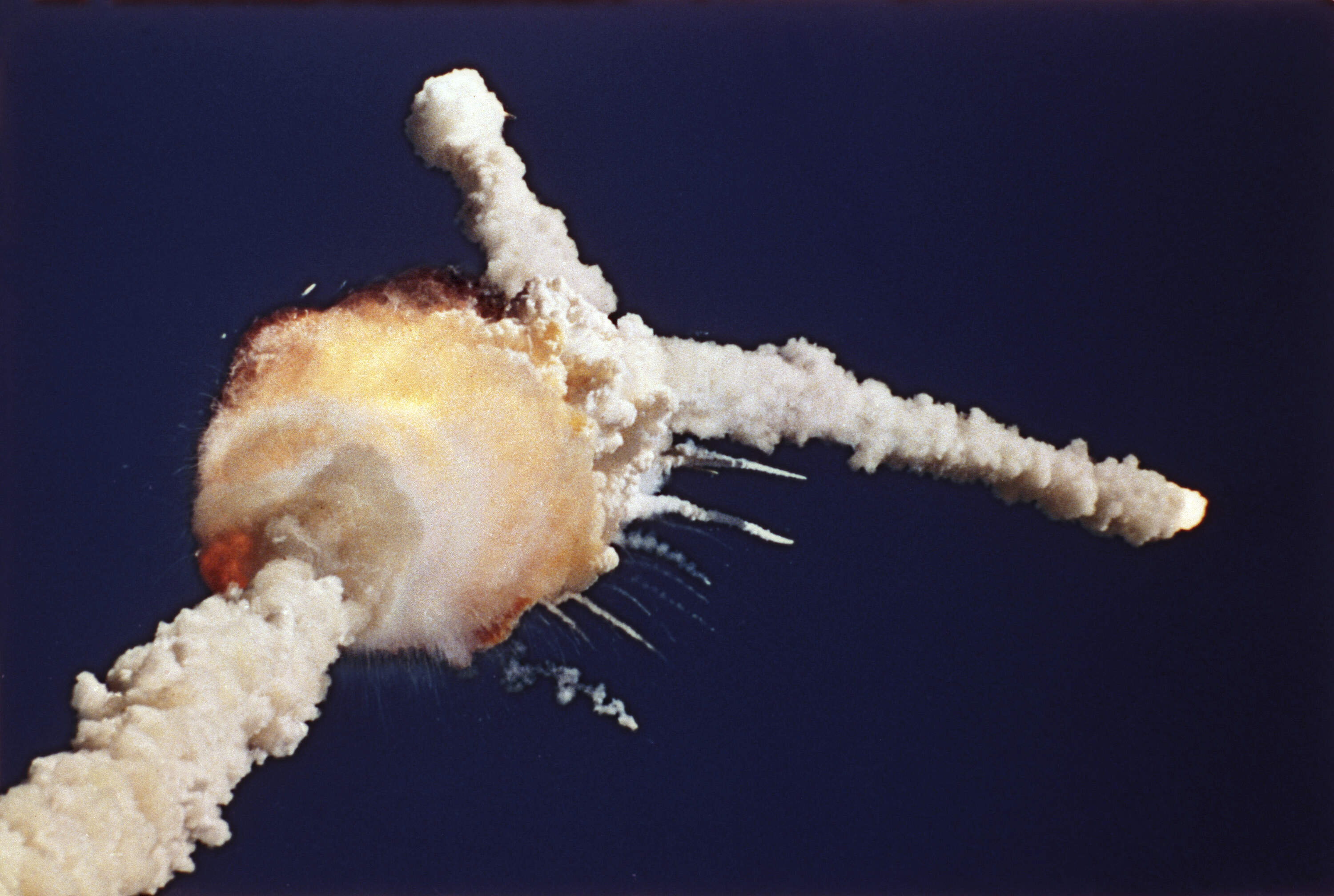 The space shuttle Challenger is destroyed shortly after lifting off, Tuesday, Jan. 28, 1986, at the Kennedy Space Center in Florida. The crew of seven, including NASA's first teacher in space Christa McAuliffe, died in the explosion. (Bruce Weaver/AP)