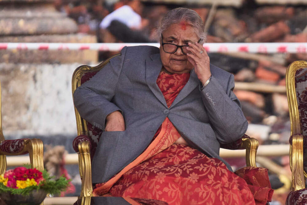 Nepal's new Prime Minister Sushila Karki waits as ministers prepare to take the oath of office administered by Nepali President Ram Chandra Poudel at the presidential building in Kathmandu, Nepal, on Sept. 15, 2025. (/Niranjan Shrestha/AP)