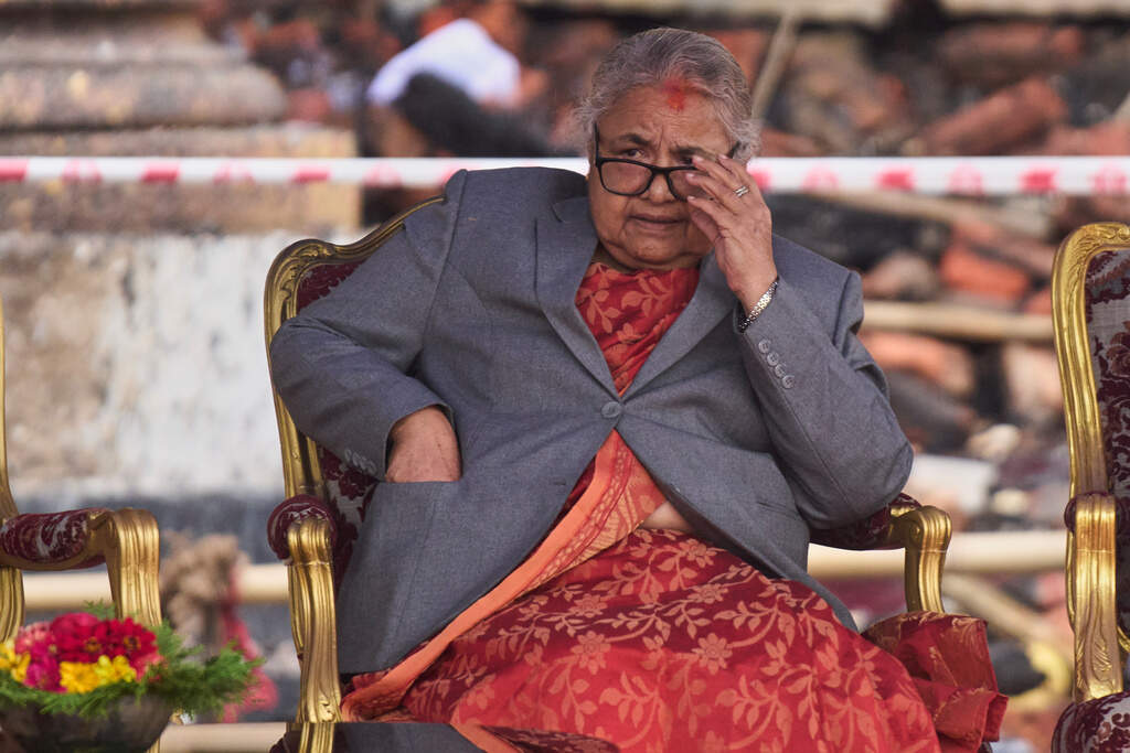 Nepal's new Prime Minister Sushila Karki waits as ministers prepare to take the oath of office administered by Nepali President Ram Chandra Poudel at the presidential building in Kathmandu, Nepal, on Sept. 15, 2025. (/Niranjan Shrestha/AP)