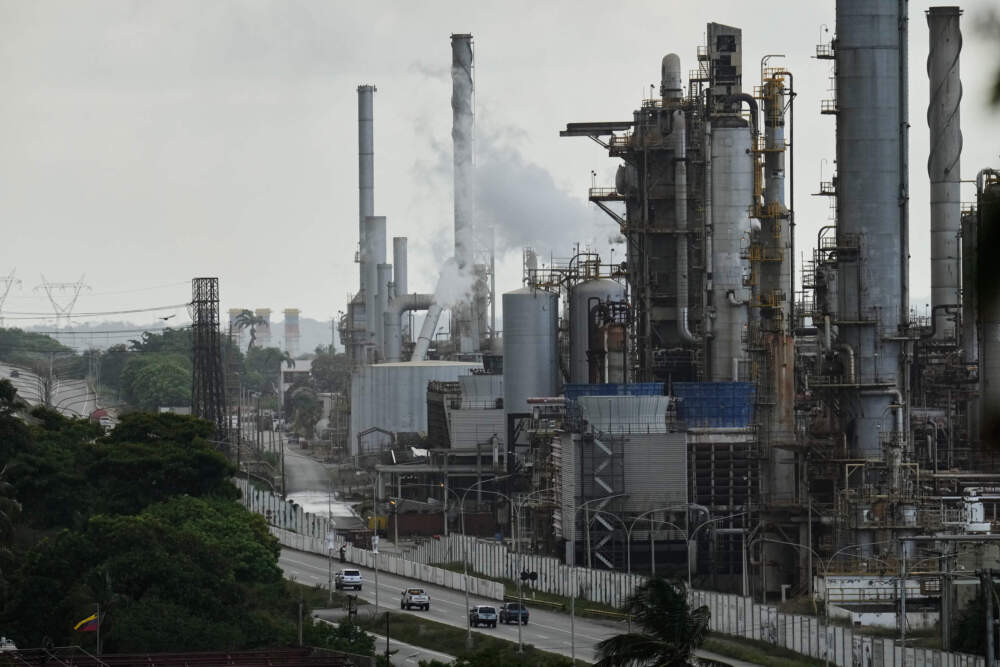 Vehicles drive past the El Palito refinery in Puerto Cabello, Venezuela, Sunday, Dec. 21, 2025. (Matias Delacroix/AP)