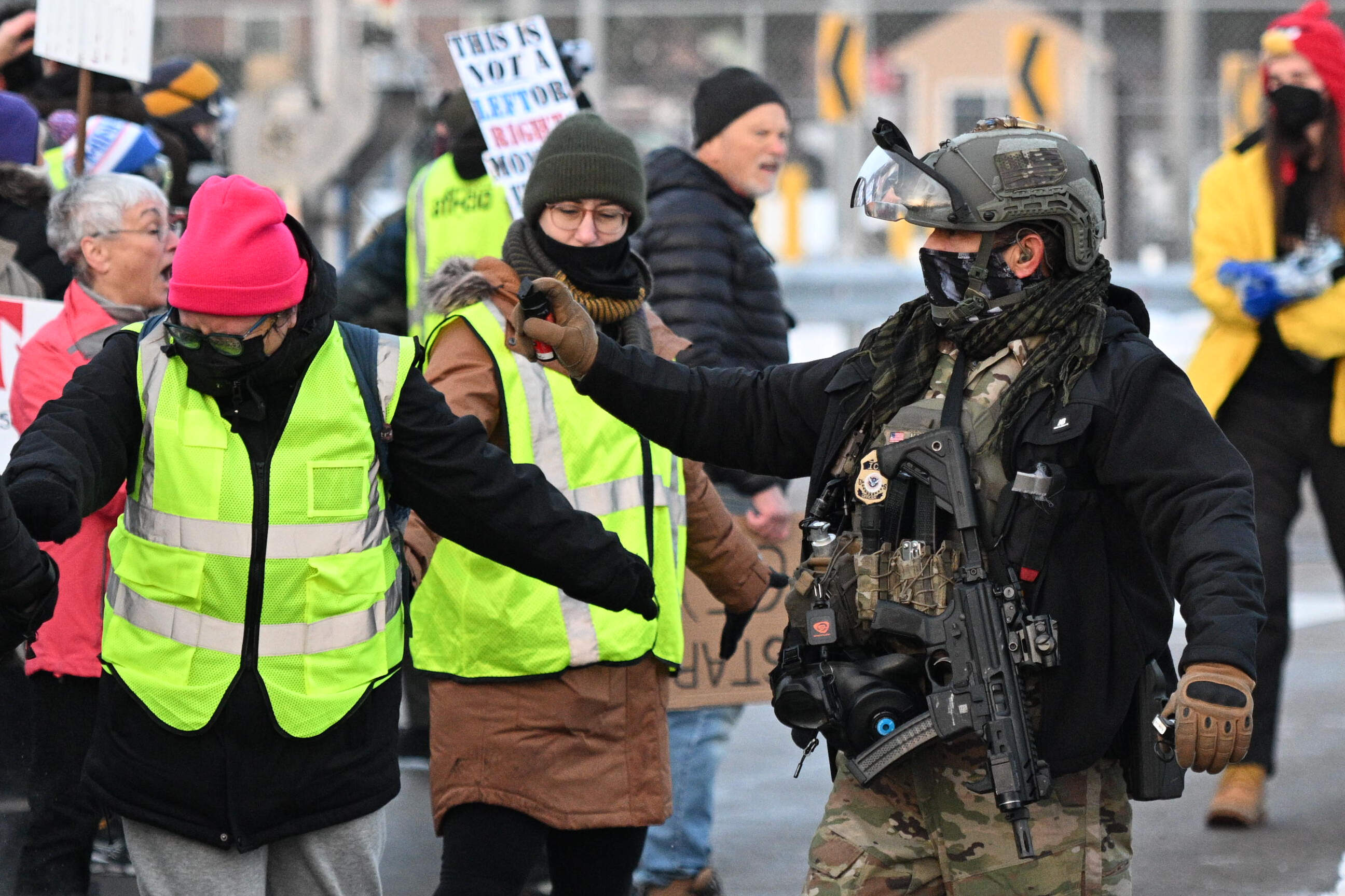 Law enforcement uses a chemical agent on protesters outside the Bishop Henry Whipple Federal Building, Thursday, Jan. 8, 2026, in Minneapolis, Minnesota. (Tom Baker/AP)
