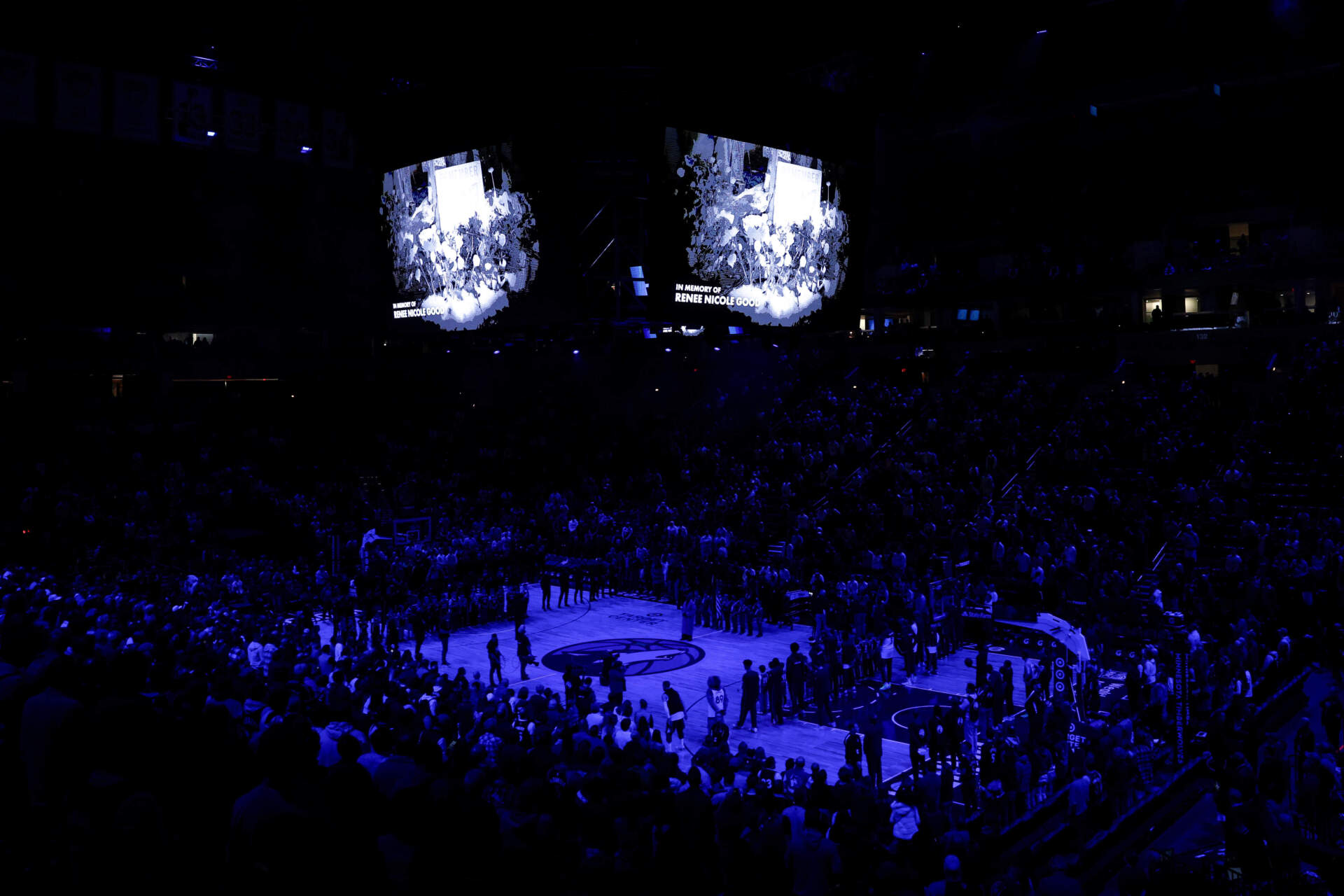 Minnesota Timberwolves and Cleveland Cavaliers players take part in a moment of silence for Renee Macklin Good before an NBA basketball game, Thursday, Jan. 8, 2026, in Minneapolis. (Matt Krohn/AP)
