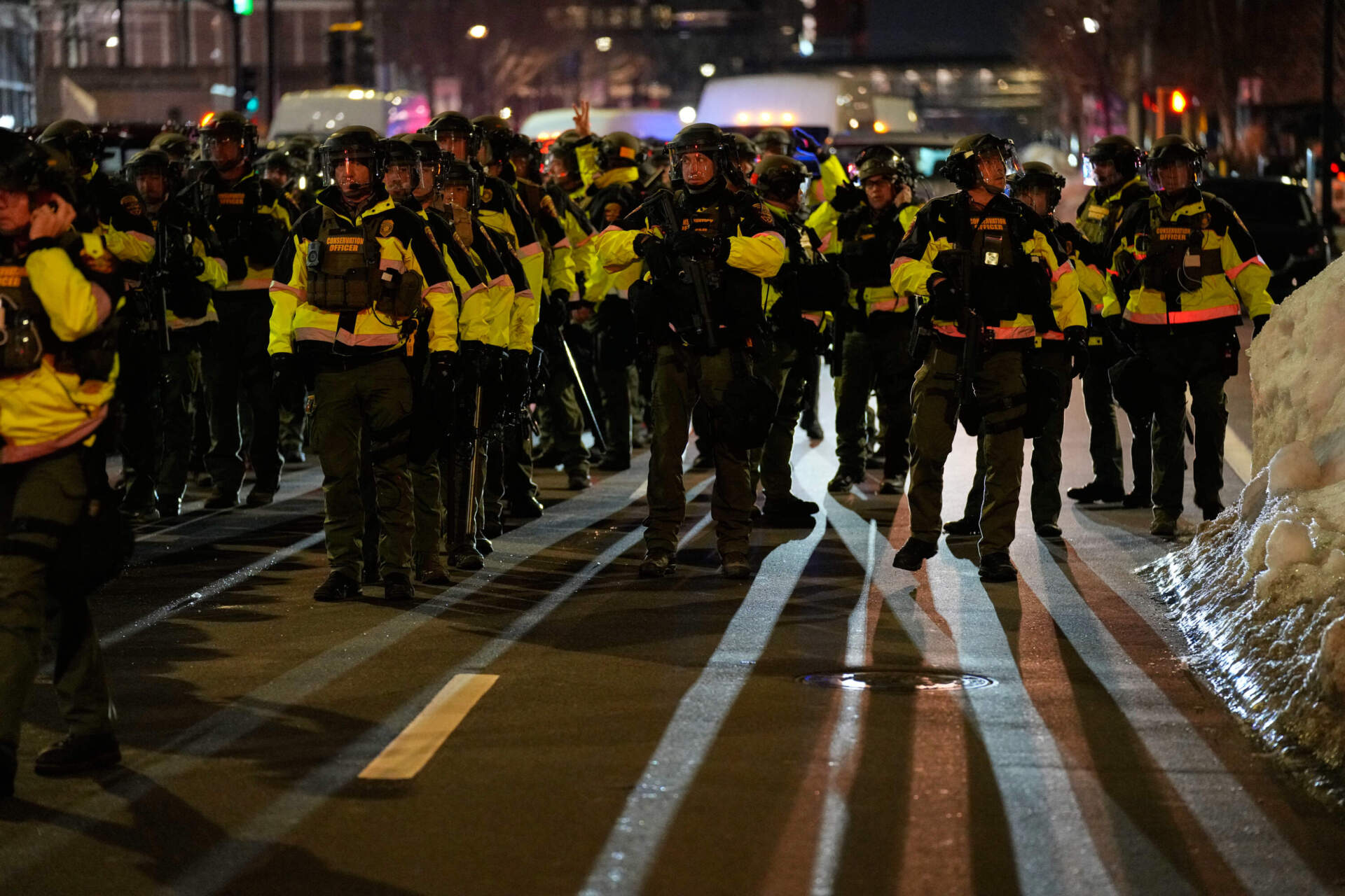 Minnesota State Patrol officers are seen during a protest and noise demonstration calling for an end to federal immigration enforcement operations in the city on Jan. 9 in Minneapolis. (John Locher/AP)