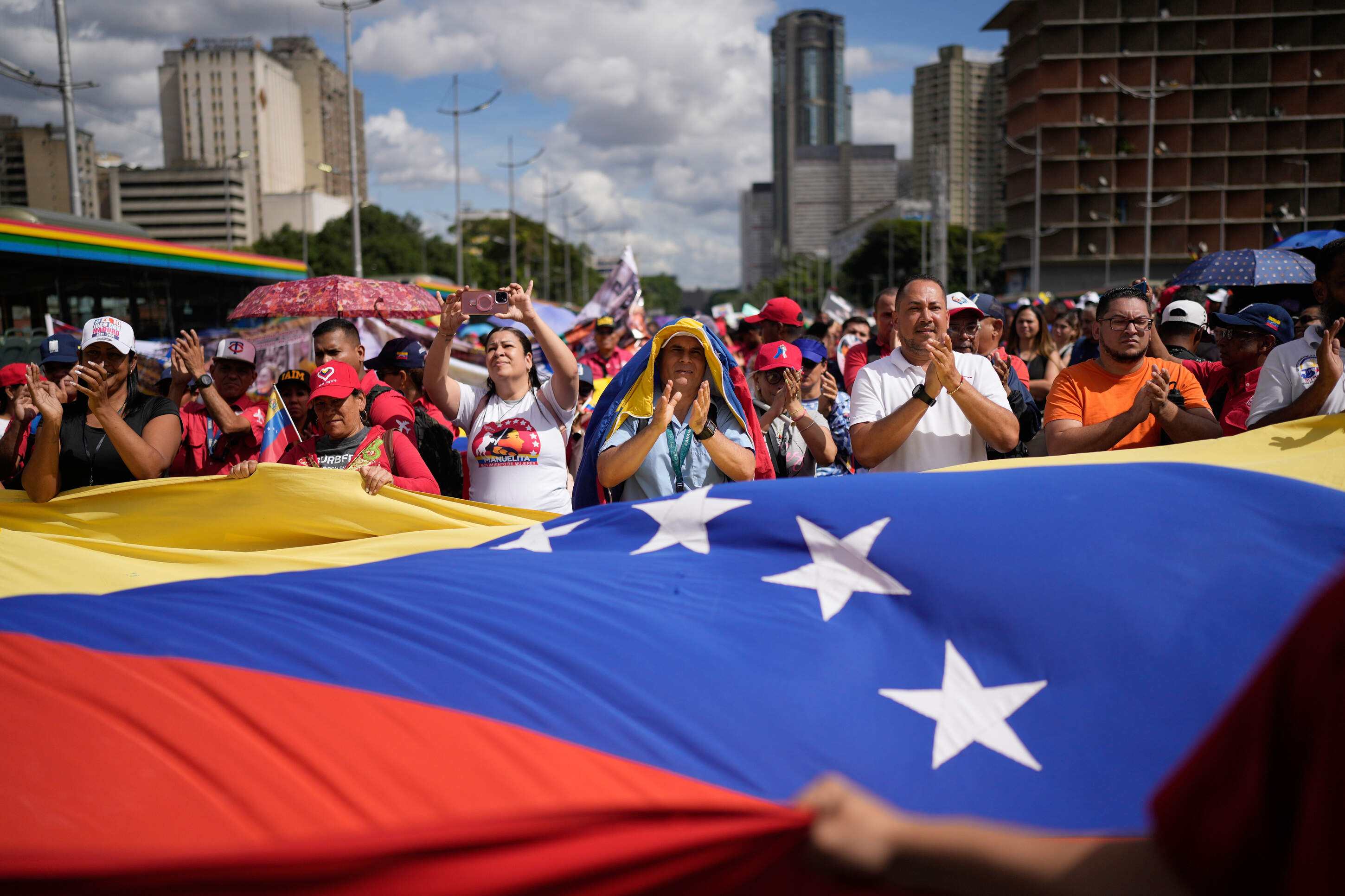 Supporters of former Venezuelan President Nicolas Maduro rally calling for his release as he faces trial in the United States after being captured by U.S. forces, in Caracas, Venezuela, Tuesday, Jan. 13, 2026. (Matias Delacroix/AP)