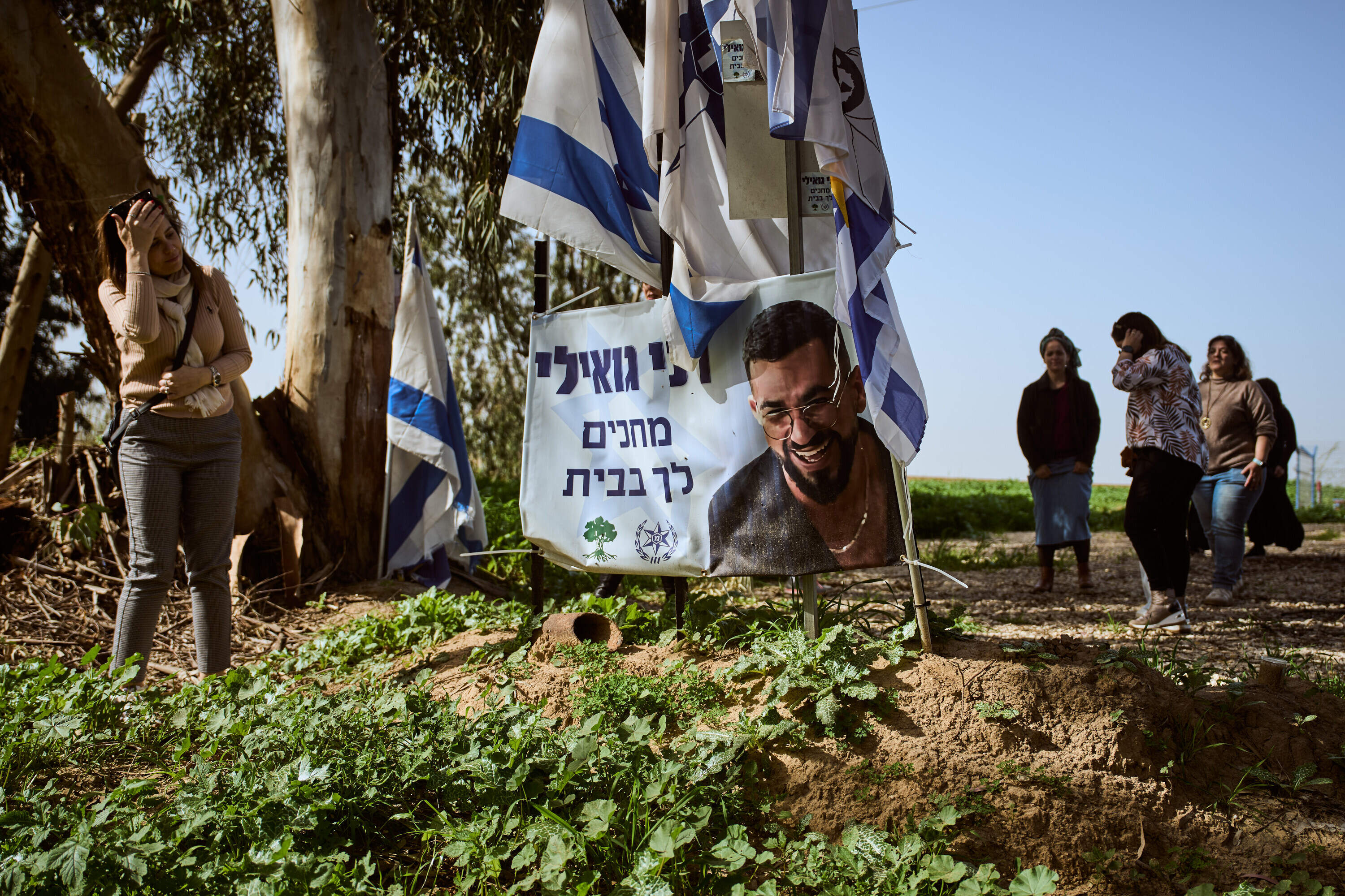 People visit a memorial site where Hamas militants killed Ran Gvili, the last hostage whose remains were recovered from Gaza, in Kibbutz Alumim, Israel, Tuesday, Jan. 27, 2026. (Oded Balilty/AP)
