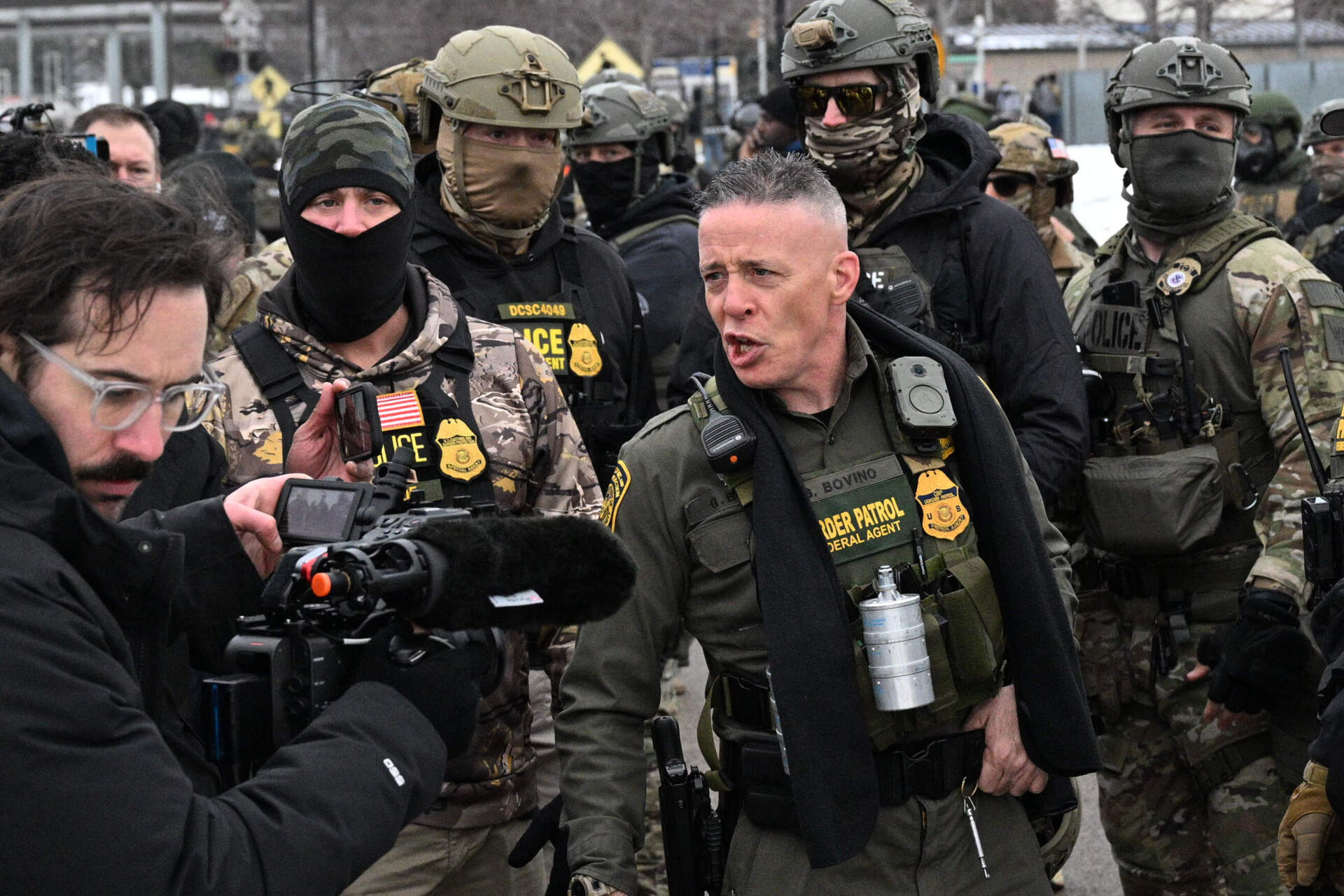 U.S. Border Patrol Cmdr. Gregory Bovino arrives as protesters gather outside the Bishop Henry Whipple Federal Building, Thursday in Minneapolis. (Tom Baker/AP)