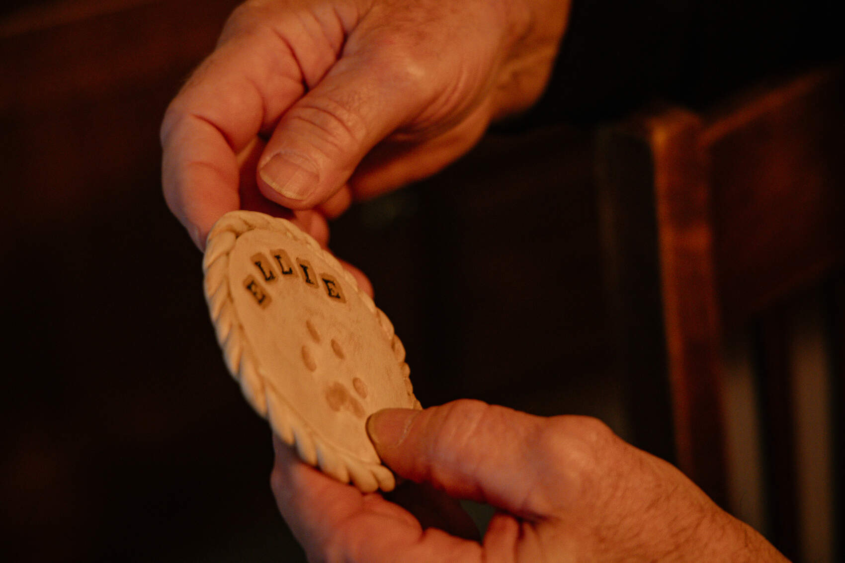 A plaster mold of Doug Fuller's late cat Ellie's paw print. (James Kelley/Iowa Public Radio)