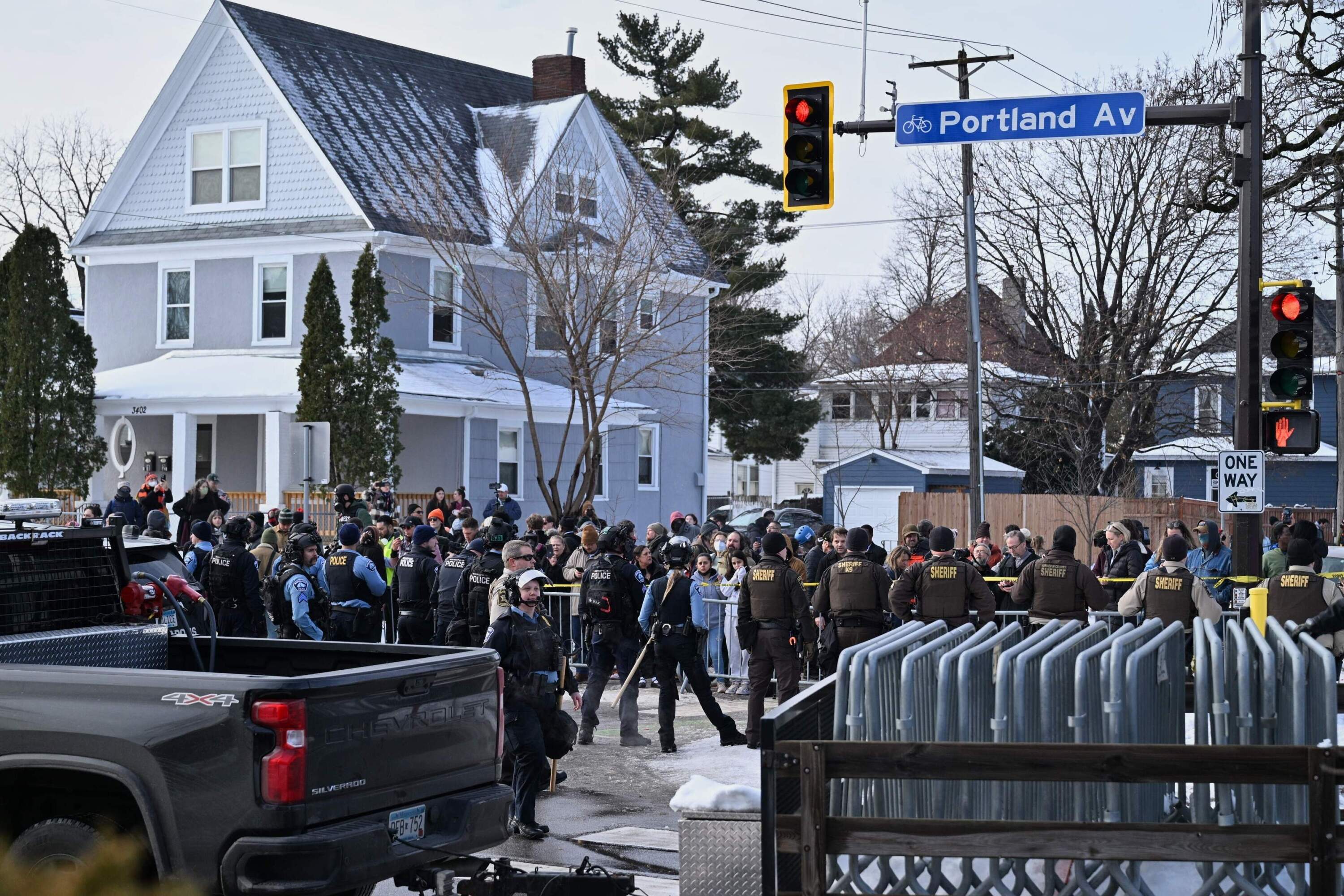 An ICE agent shot and killed a woman in her car in Minneapolis on Wednesday. (Tom Baker/AP)