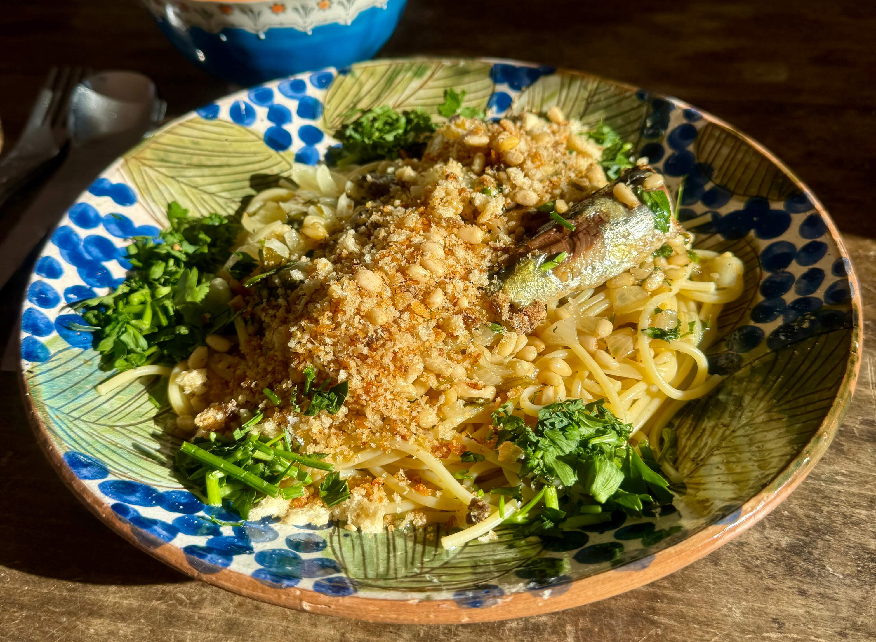 Spaghetti with sardines, lemon, pine nuts, anchovy-pine-nut-breadcrumb topping. (Kathy Gunst/Here &amp; Now)