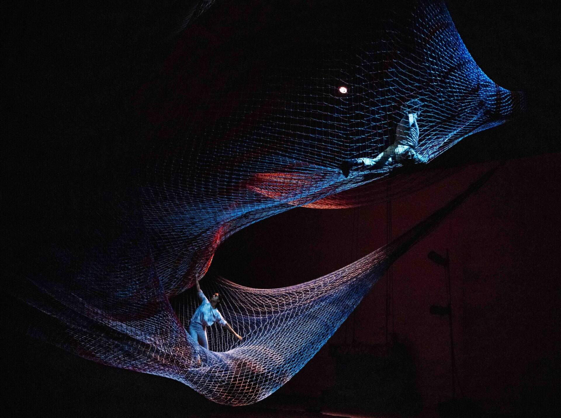 In "Noli Timere," eight dancers move in and around sculptor Janet Echelman's custom-made net. (Courtesy Marie Andree Lemire)