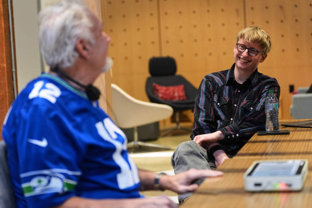 OneCourt founder Jerred Mace, right, talks with Clark Roberts, a blind Seattle Seahawks fan who has had the chance to try out OneCourt tablet Tuesday, Jan. 27, 2026. (Lindsey Wasson/AP)