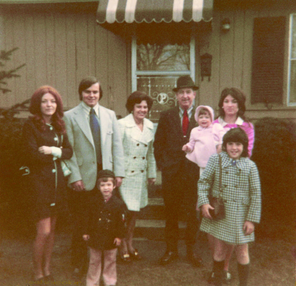 The author's older sister Patty and her husband Doug, Yolanda, Jocko, Carol holding Kristen (1), Jeff (2), and the author at age 10, in front of the Page family's tan ranch house in Braintree in 1972. (Courtesy Pegasus Books)