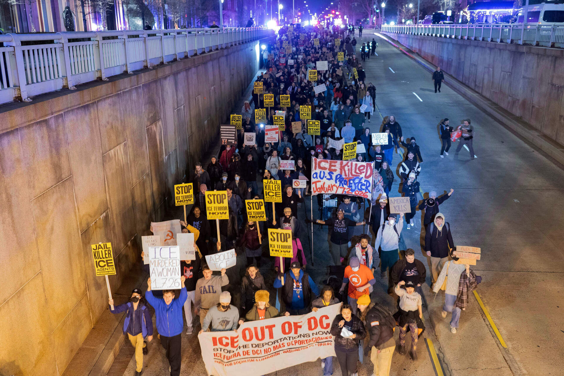 Demonstrators march to the White House in Washington, D.C. on Thursday, Jan. 8, as they protest against immigration enforcement activity. (Jose Luis Magana/AP)