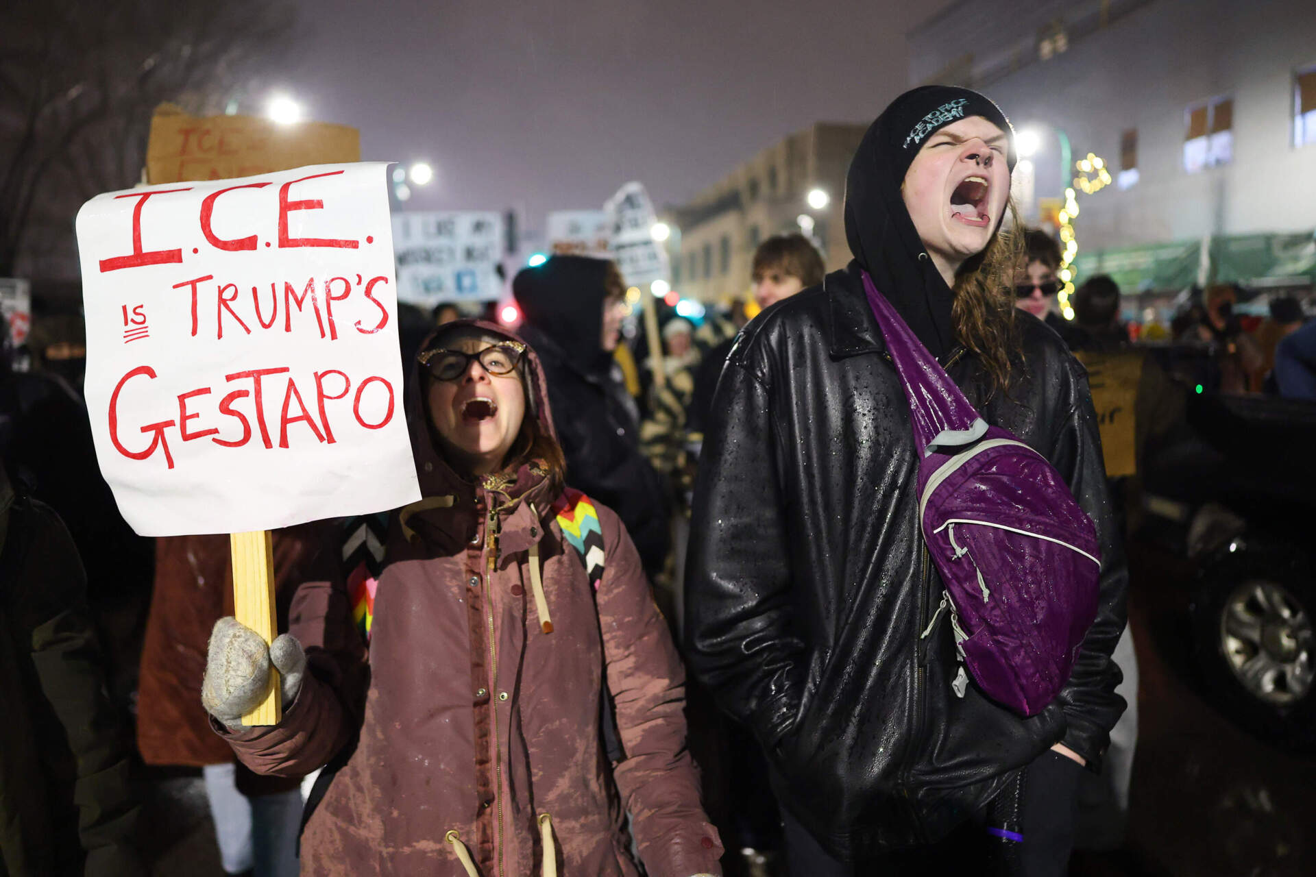 Protesters at a rally for Renee Good, on Thursday, Jan. 8, in Minneapolis, after an ICE officer fatally shot her the day before. (Adam Bettcher/AP)