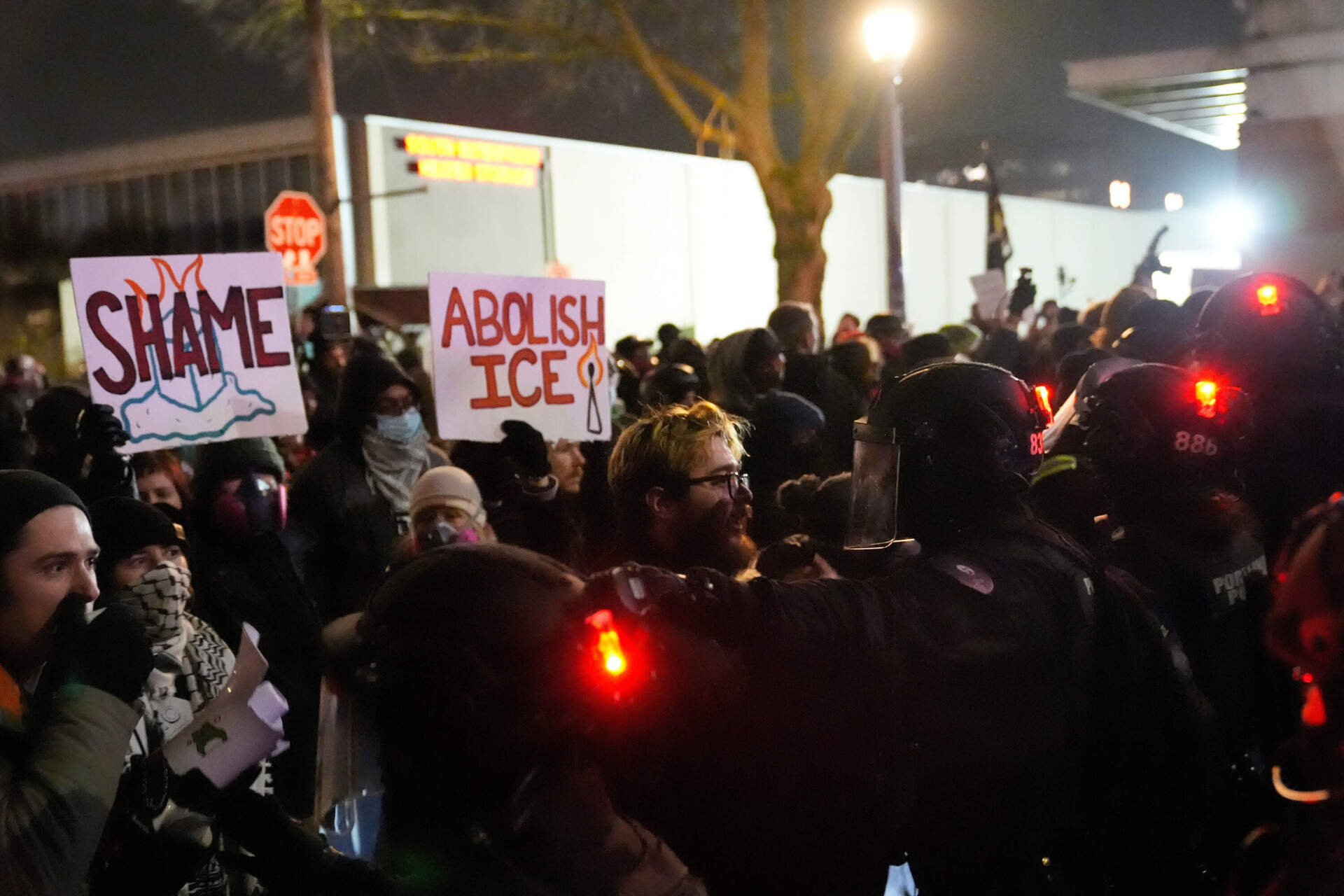 Demonstrators outside the U.S. Immigration and Customs Enforcement facility in Portland, Oregon. (Jenny Kane/AP)