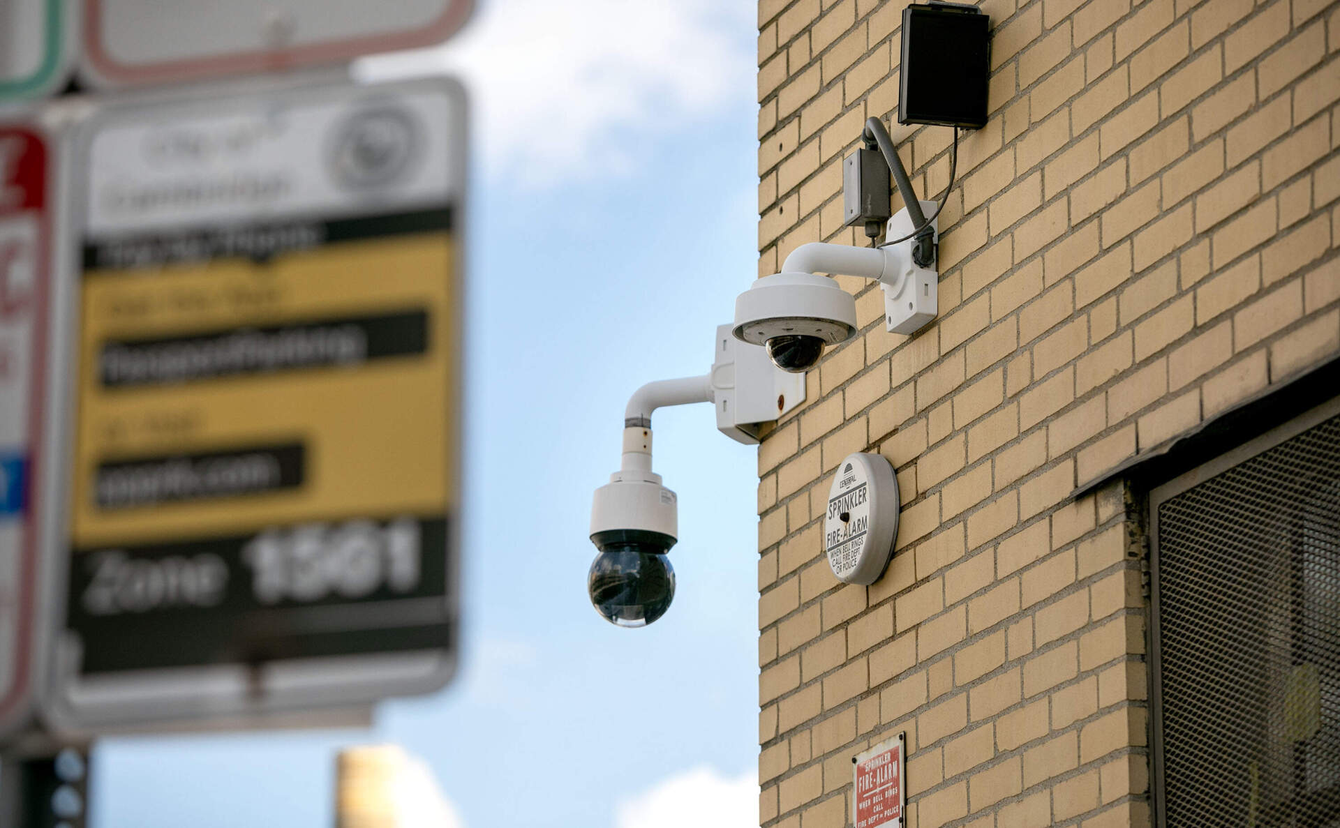 Security cameras on Albany Street in Cambridge, near the Plasma Science and Fusion Center buildings. (Robin Lubbock/WBUR)
