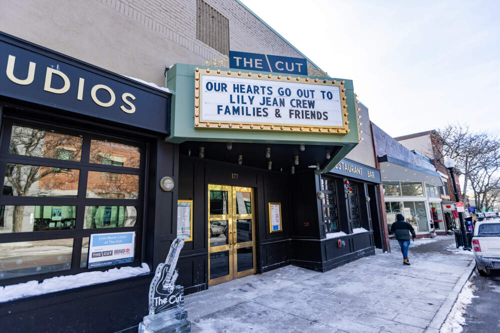 The marquee sign on The Cut Restaurant and Bar on Main Street in Gloucester pays tribute to the crew of the Lily Jean. (Jesse Costa/WBUR)