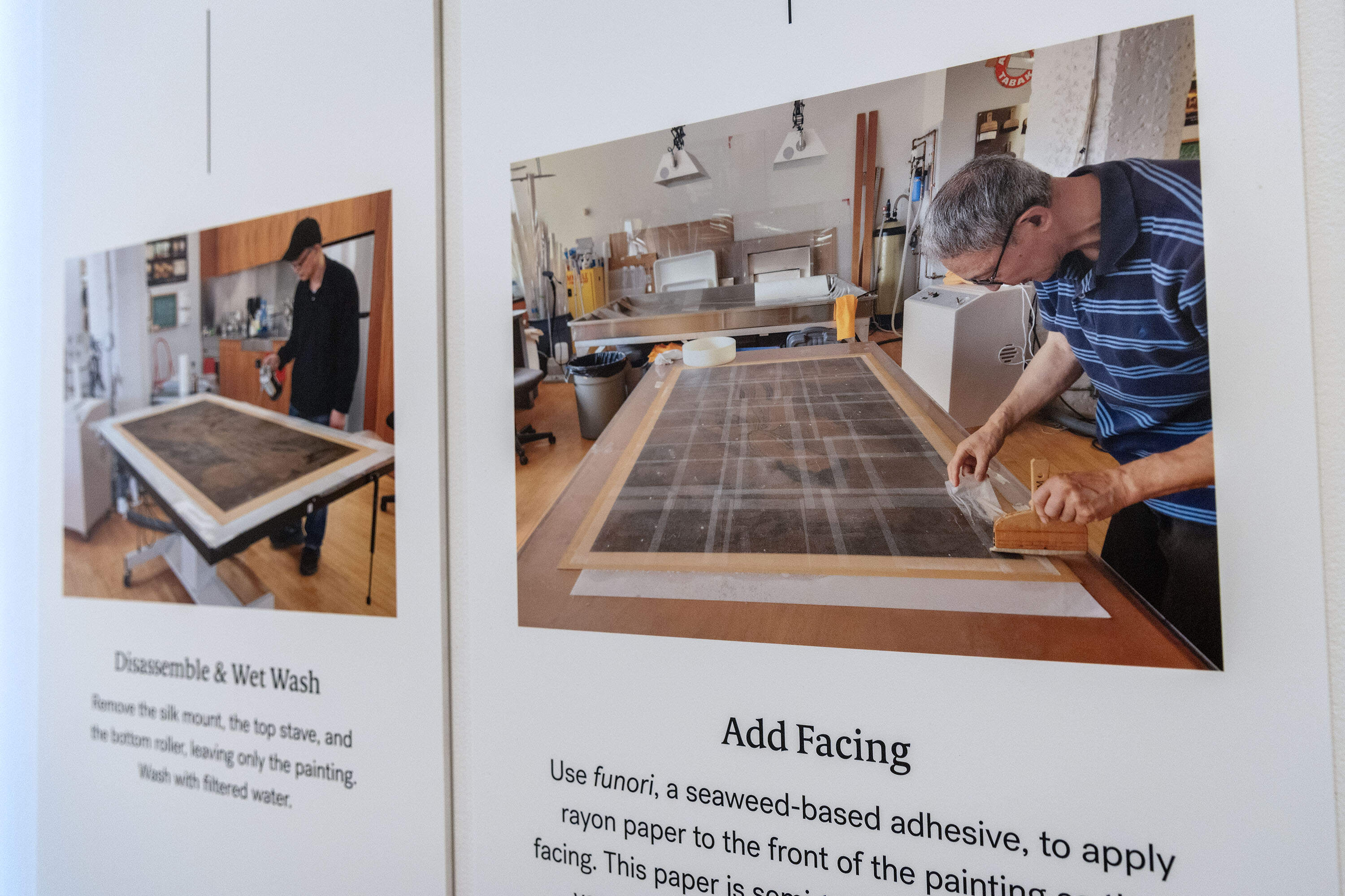 Two panels from the exhibit's description of the conservation process, show conservator Jing Gao at work on the Immortal Magu scroll. (Robin Lubbock/WBUR)