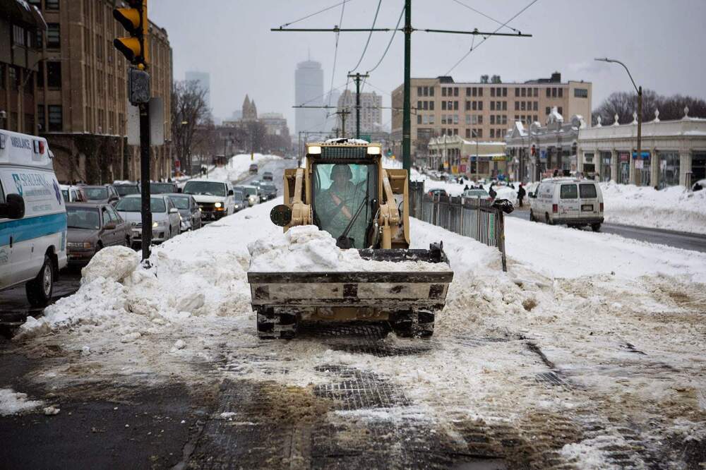 National Guard members cleared snow piles from the MBTA tracks on Commonwealth Avenue after a snowstorm on Feb. 17, 2015. (Jesse Costa/WBUR)