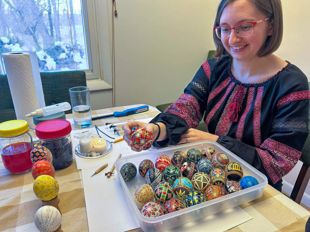 Vika Wasyliw-Yap shows a collection of her favorite pysanky. (Amanda Beland/WBUR)
